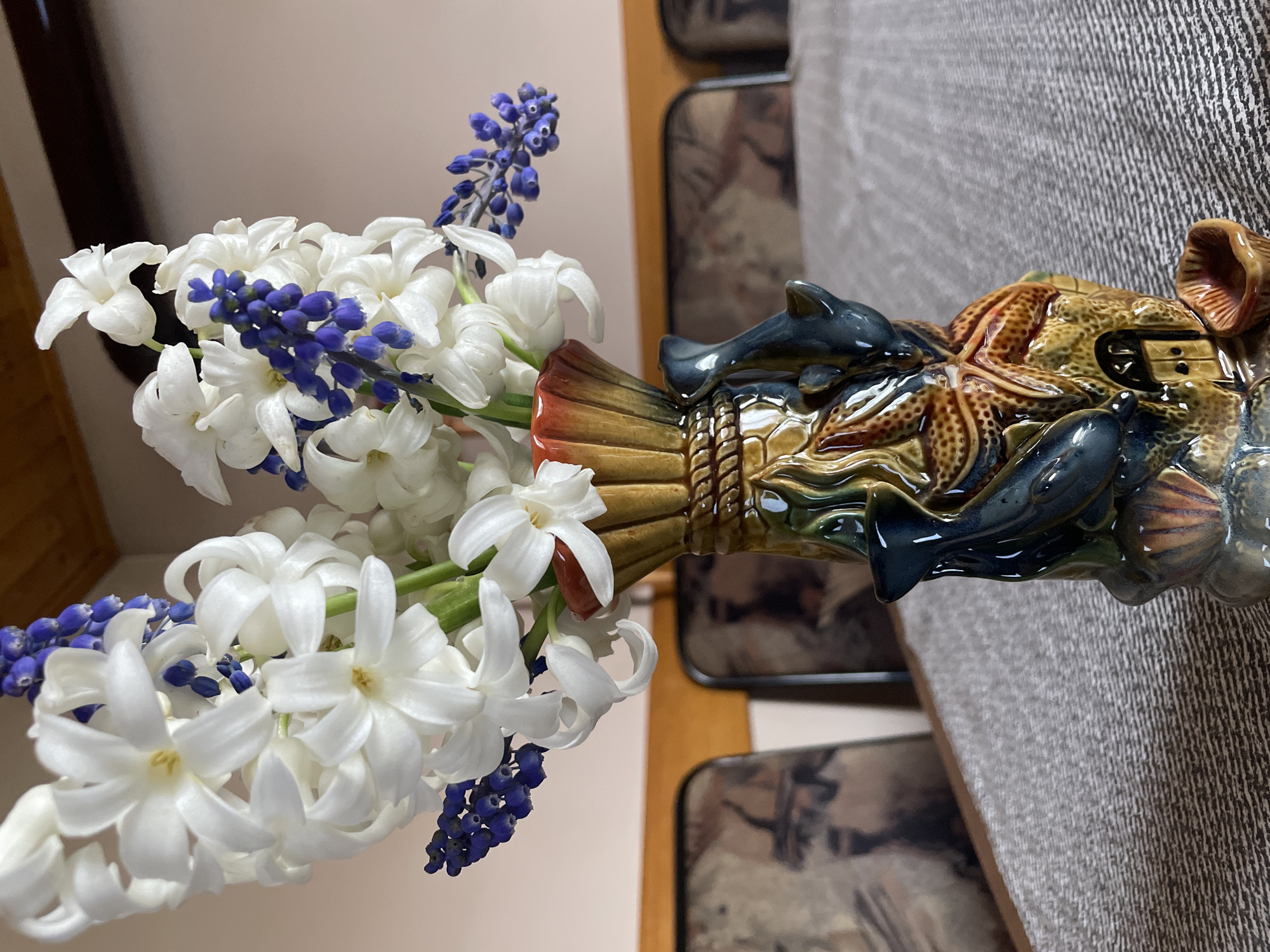 White and purple flower bouquet displayed in Bulgarian home