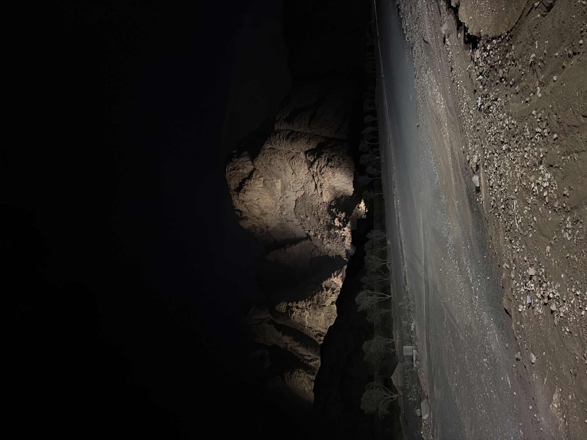 Nighttime cliff and road scenes documented near Egyptian mausoleum