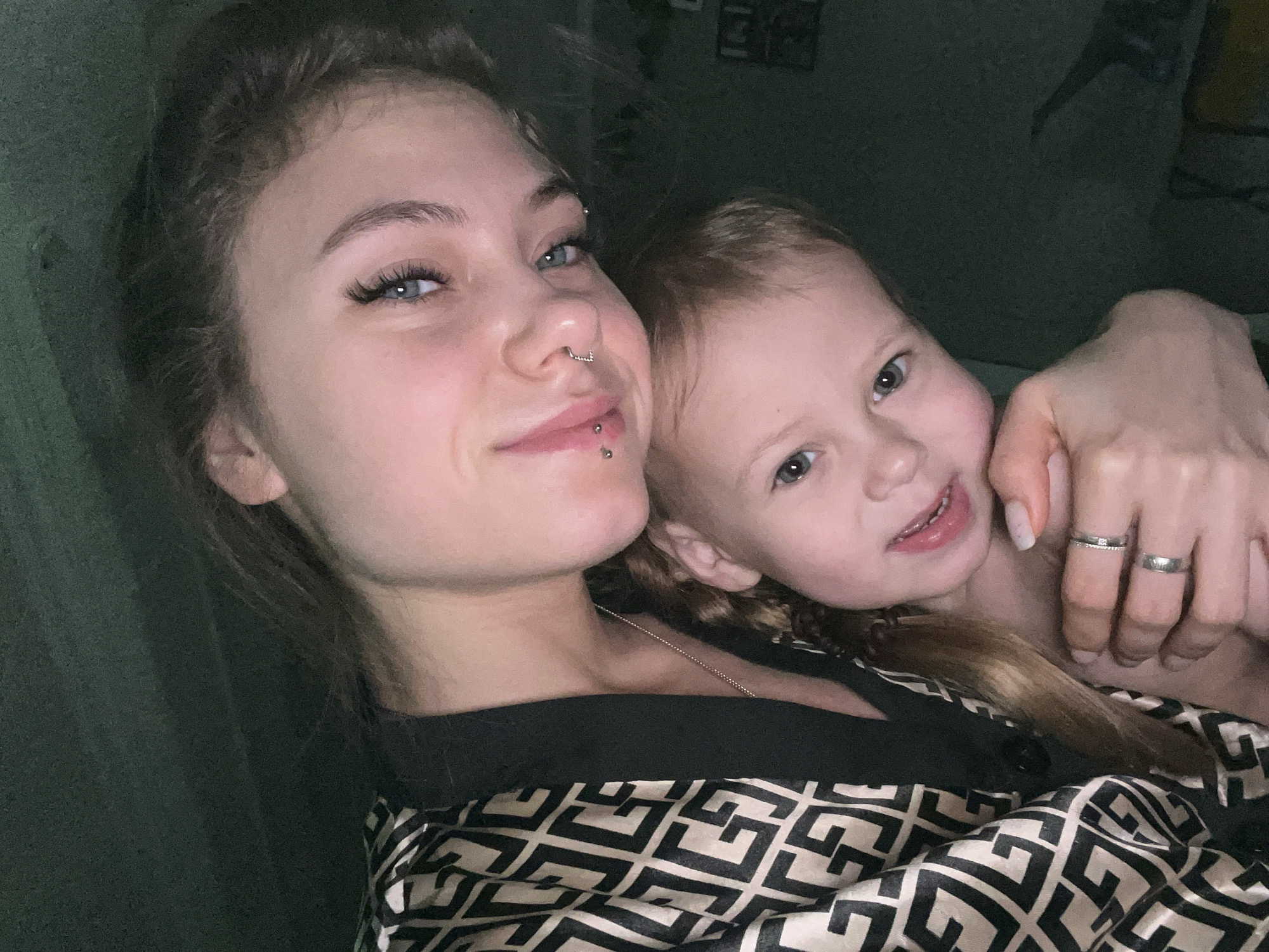 Woman takes selfies with child in Russian village