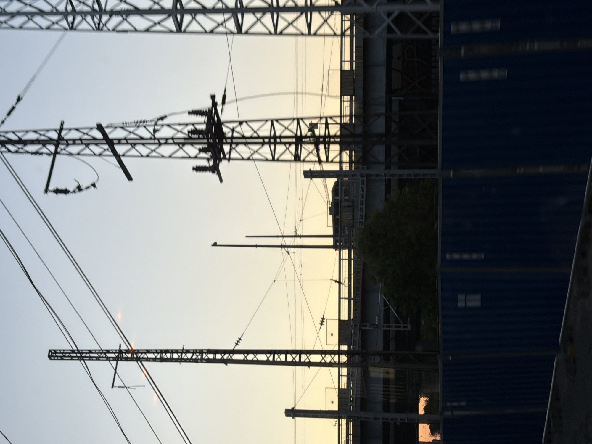 Sofia's electrical infrastructure at golden hour, seen in transit