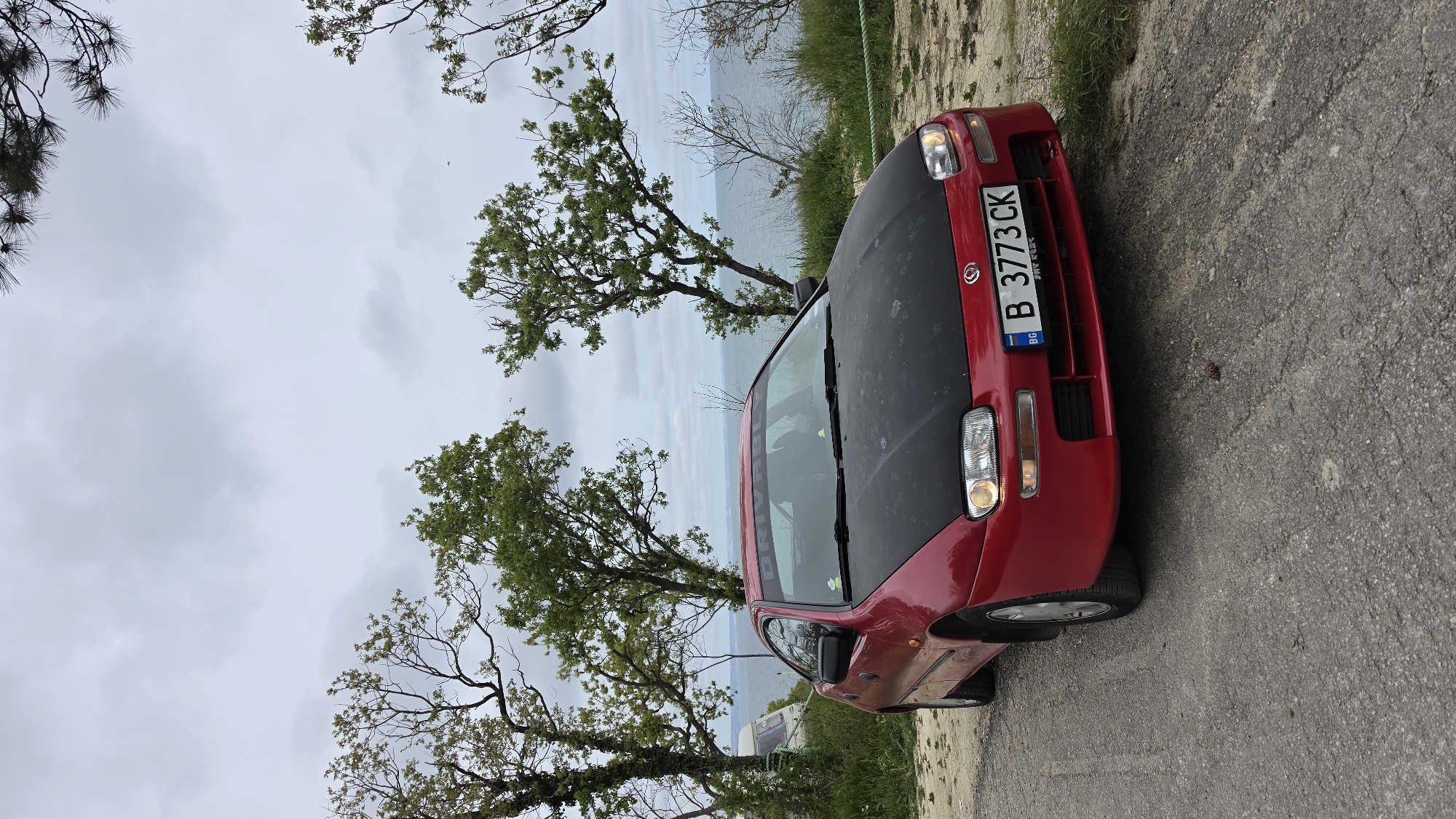 Red Mazda spotted parked overlooking Black Sea in Varna