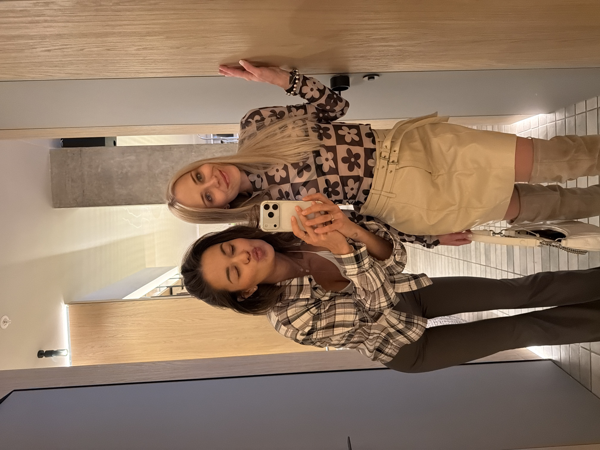 Two women take selfie in Krasnoyarsk dressing room