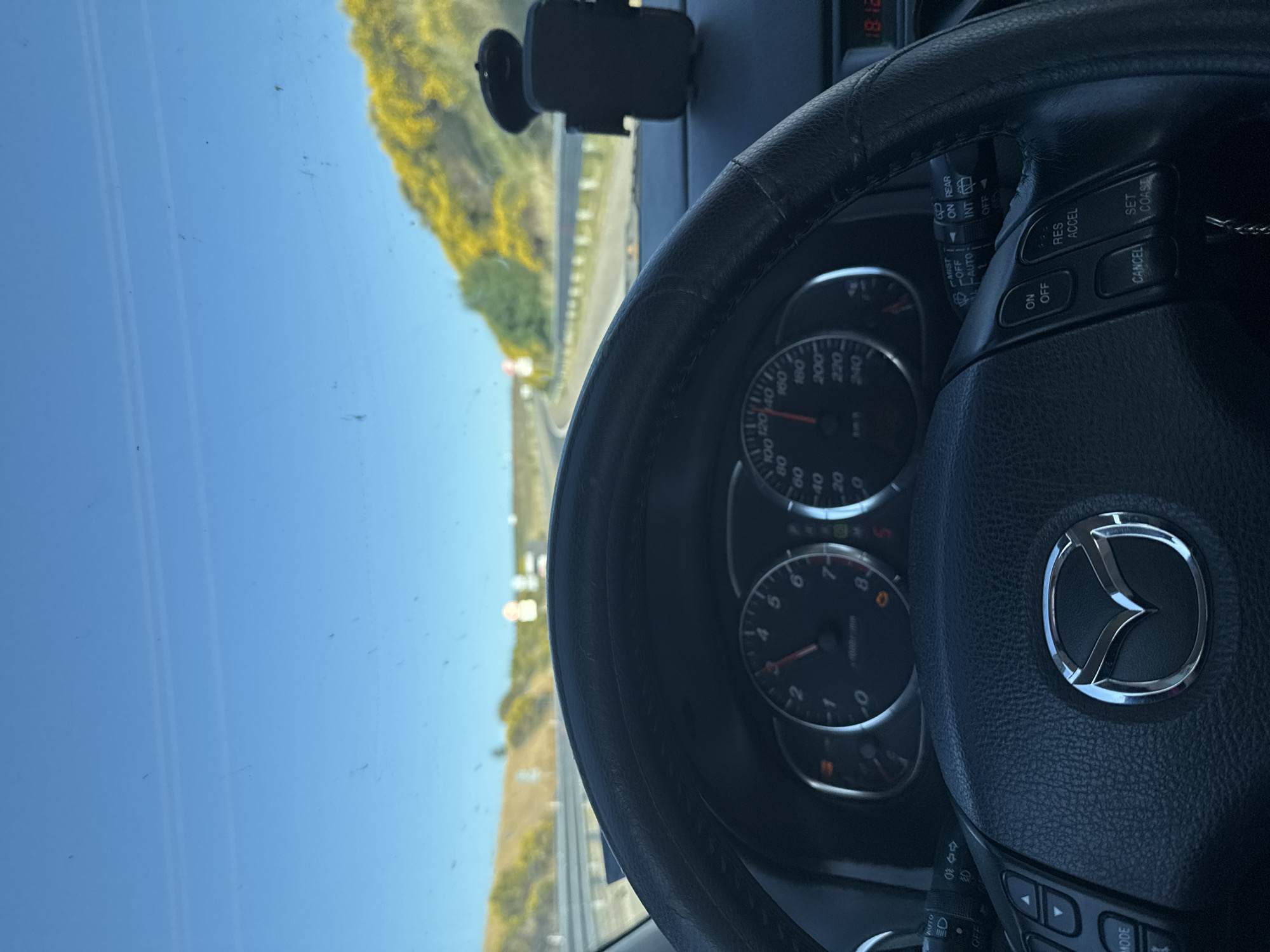 Driver's perspective captured inside Mazda vehicle in Vratitsa, Bulgaria