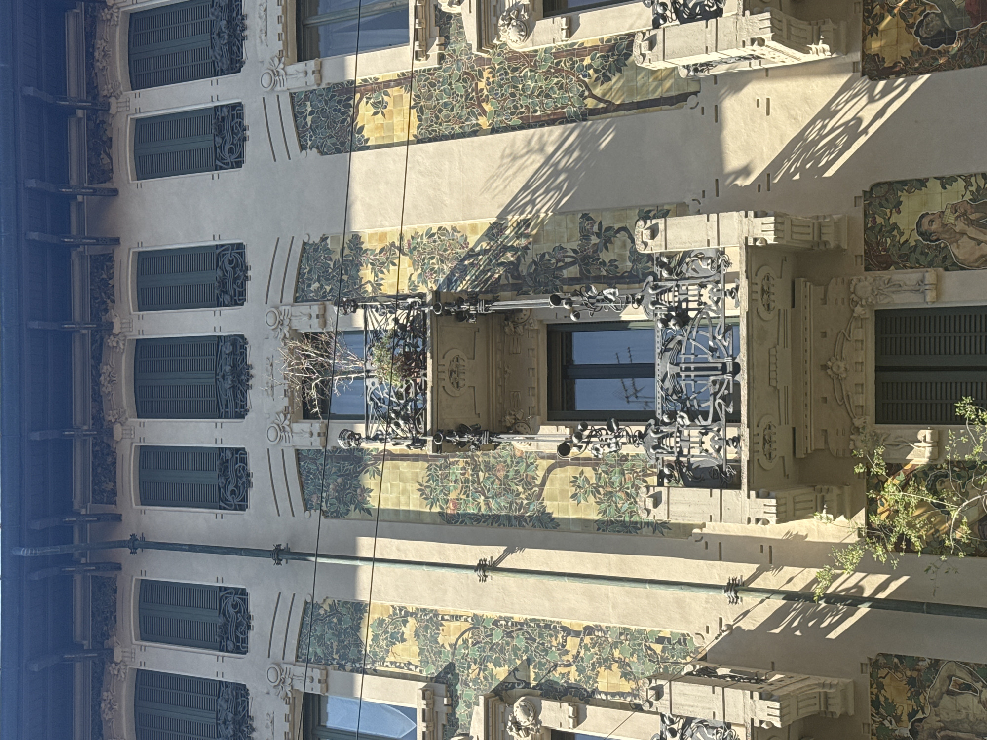Milan architecture and outdoor seating observed during midday