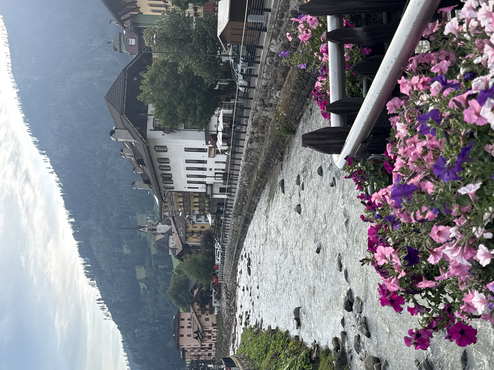 Afternoon stroll through Moena's alpine town center, Dolomites