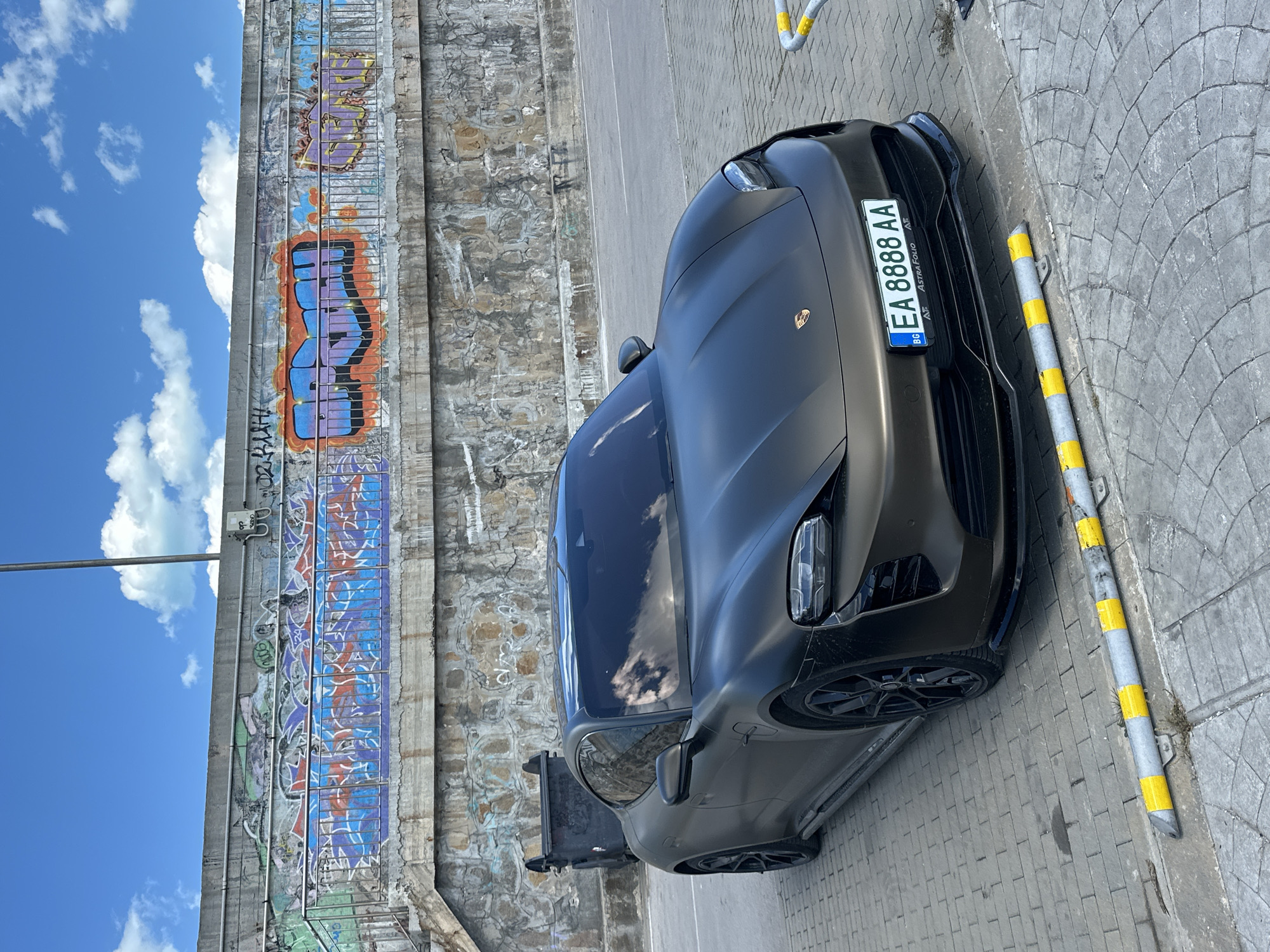 Porsche spotted at Varna marina amid docked sailboats
