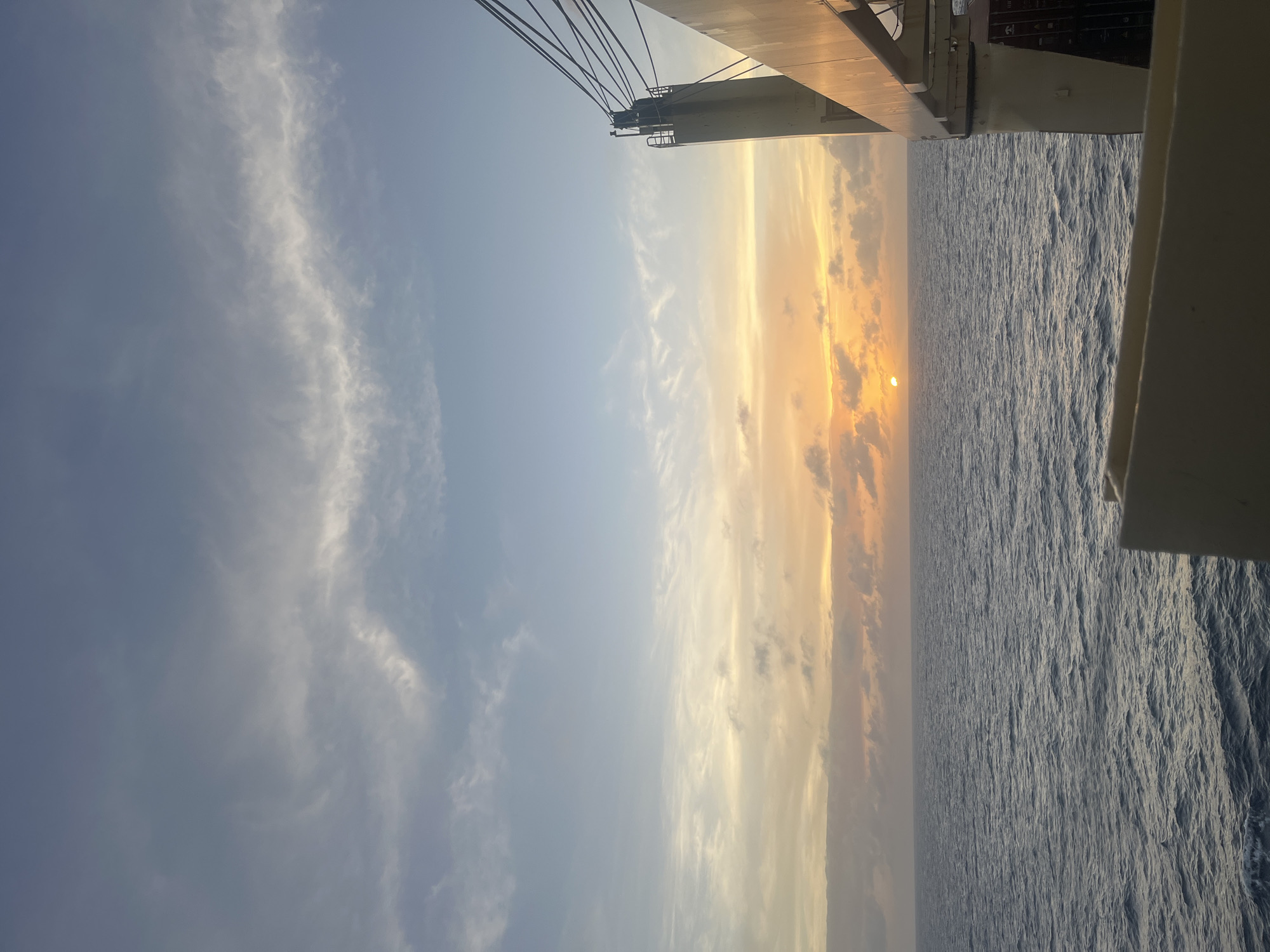Sunset over ocean documented from vessel April 9