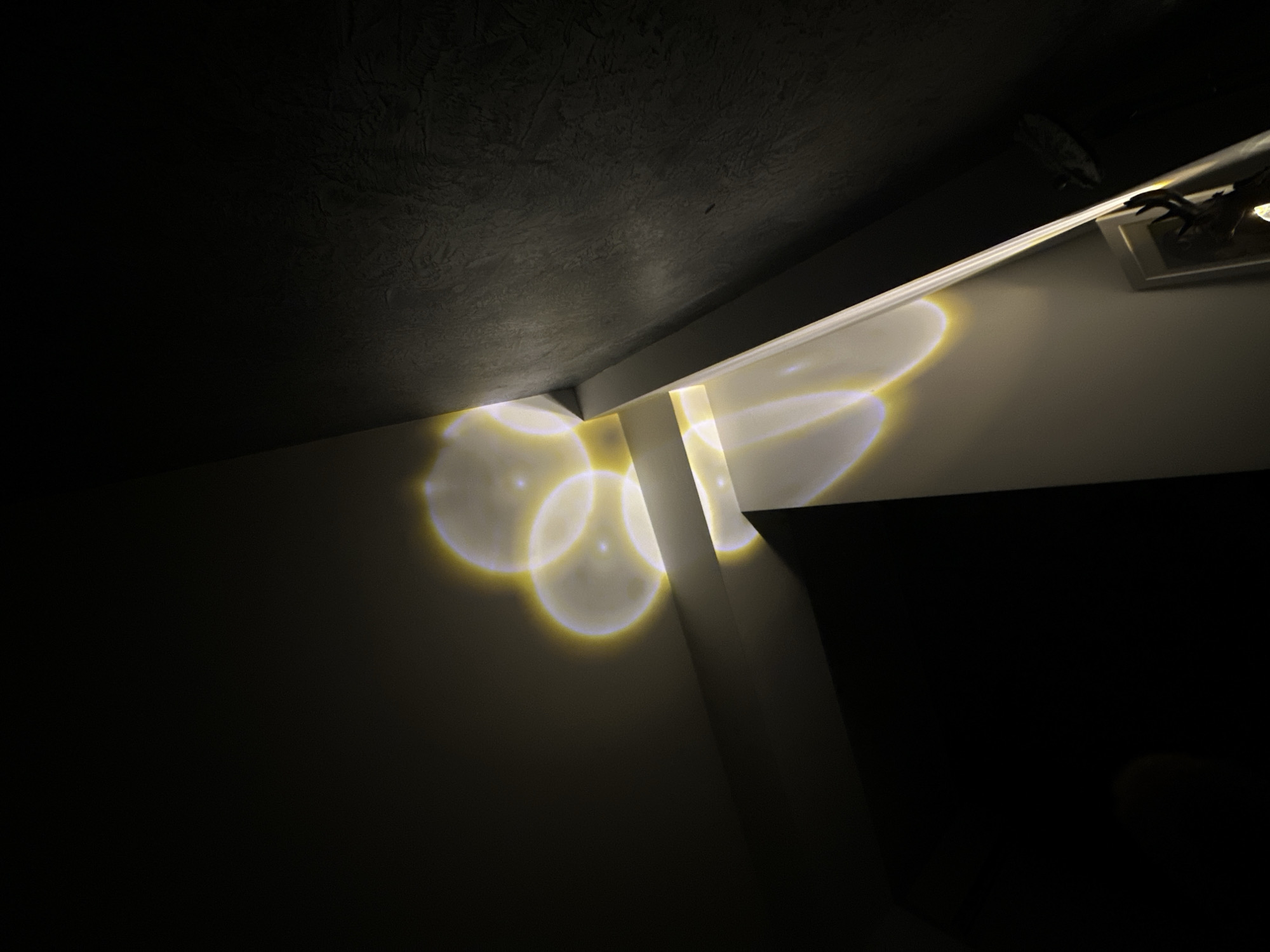 Sofia bedroom setup: gaming, ambient light, and everyday objects