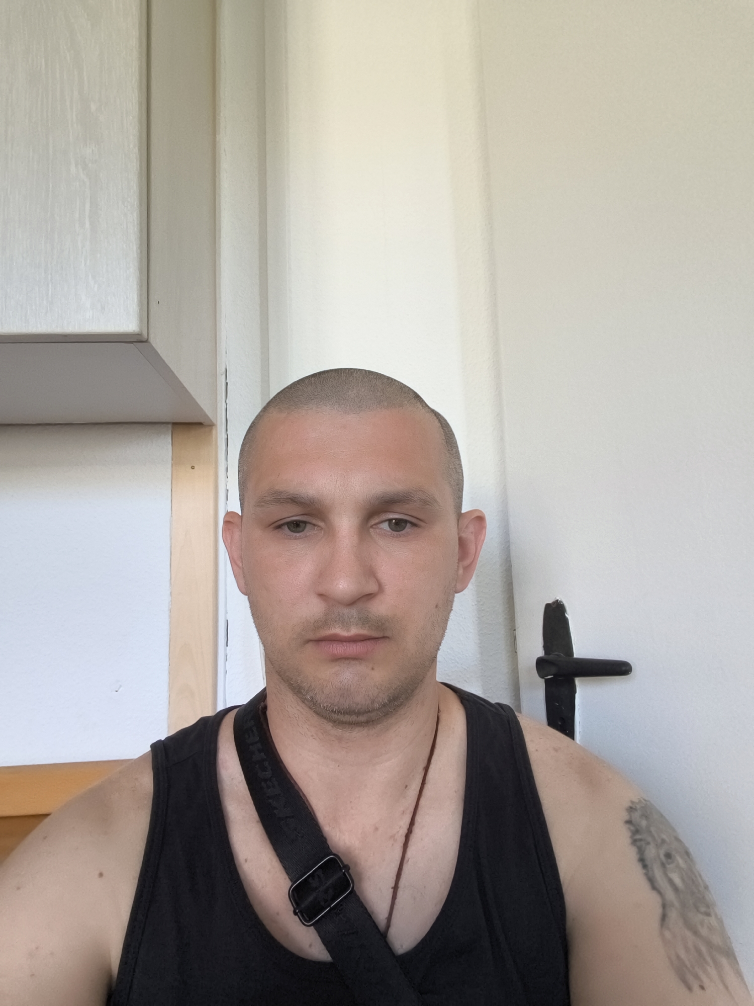 Quick personal photo session, black tank top, indoors.