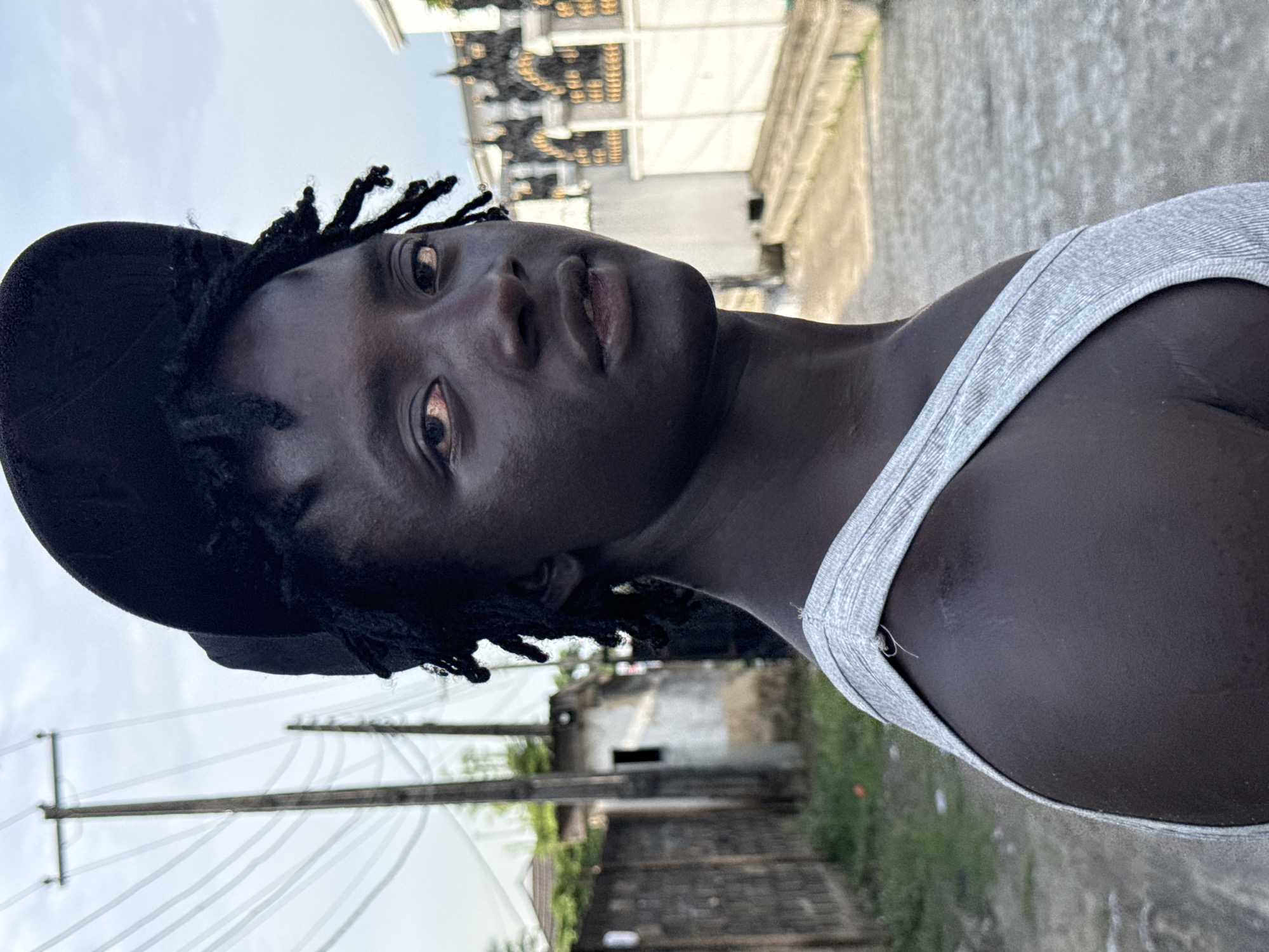 Street scenes captured in Ado, Nigeria during afternoon hours