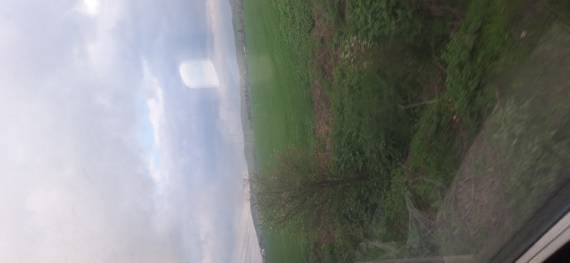 Rural landscape with power lines documented in Bulgarovo, Bulgaria