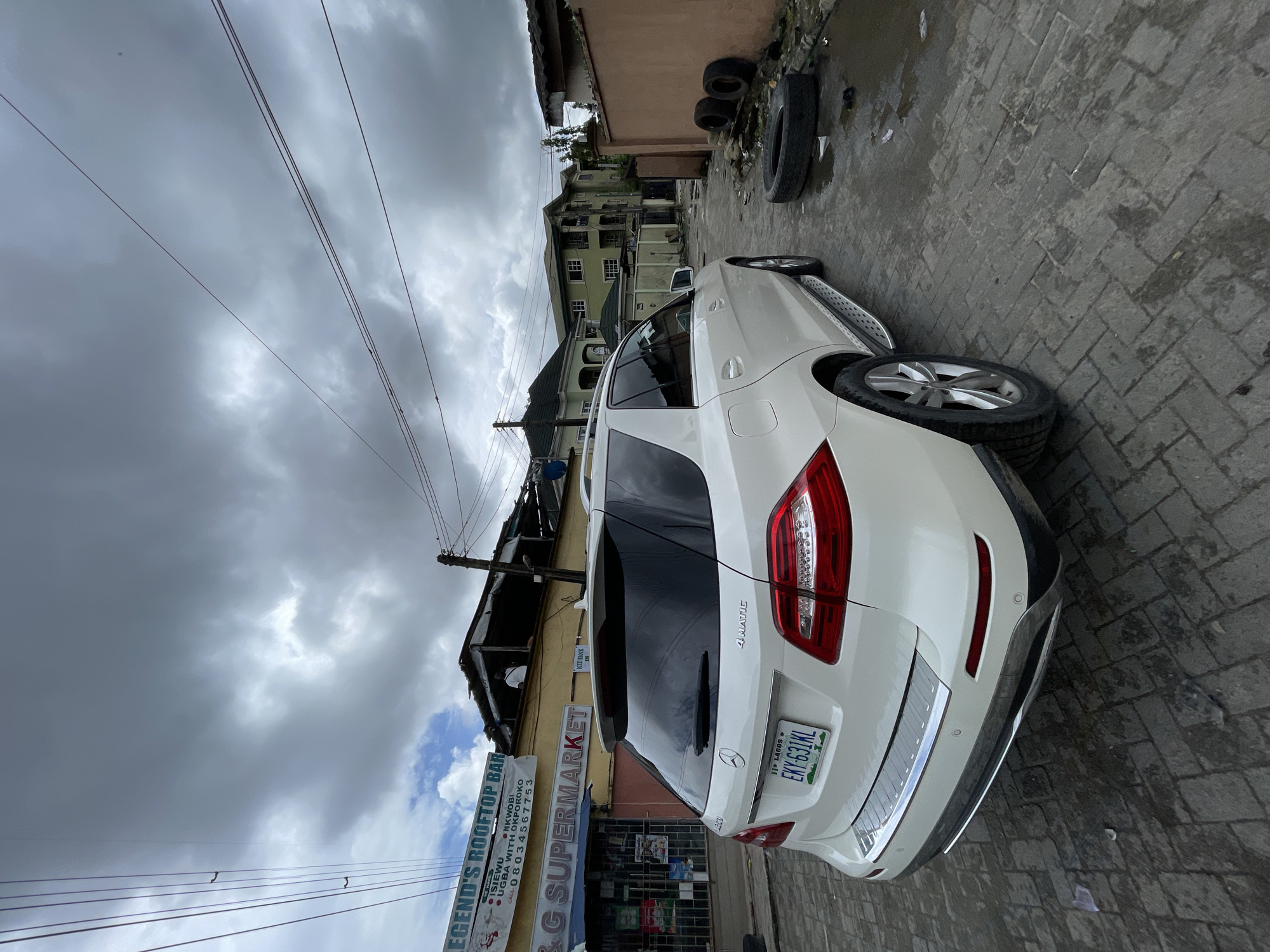 Morning street and market activity across Ado, Nigeria