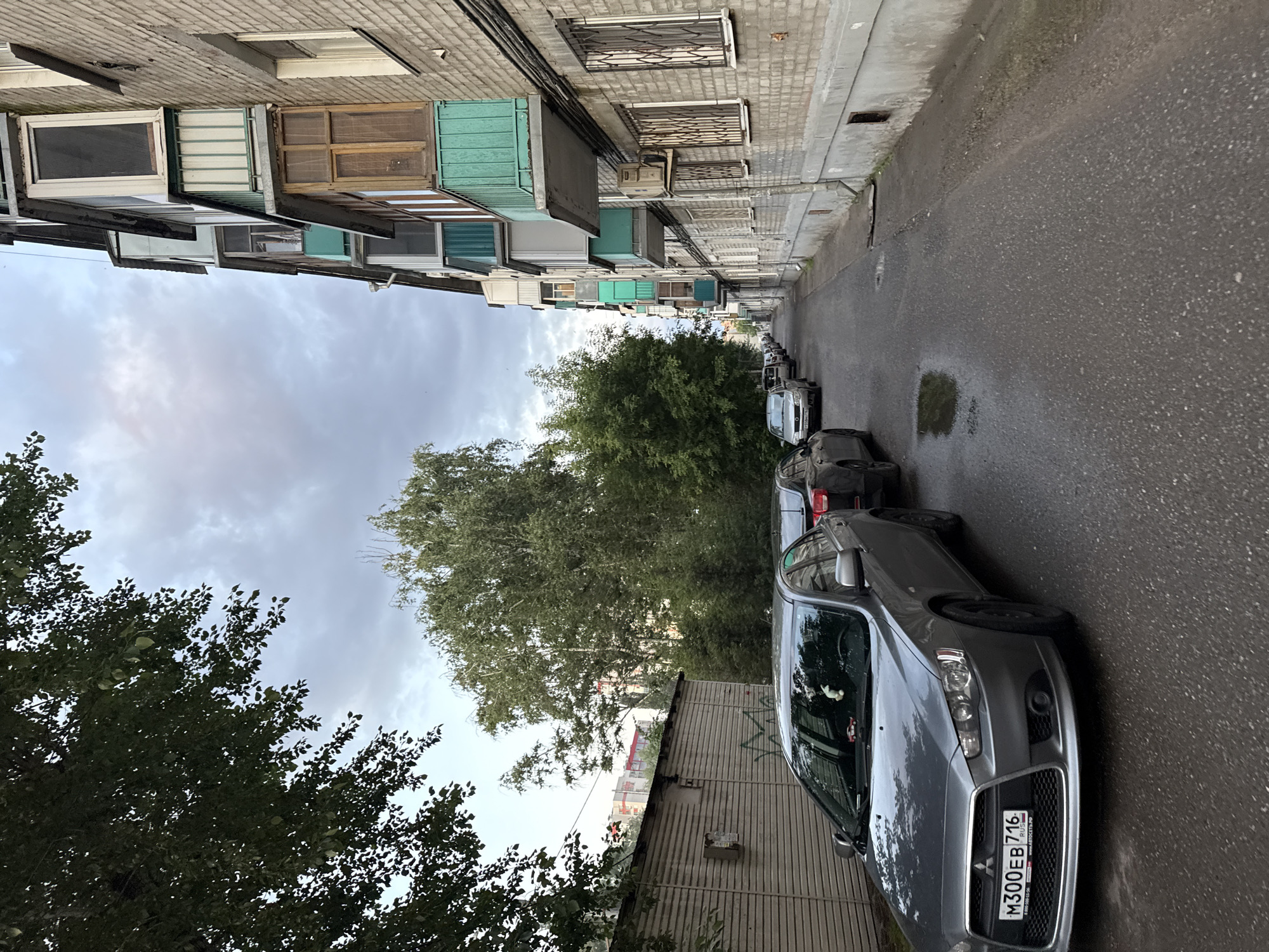 Afternoon at a Kazan weightlifting gym, streets outside at dusk