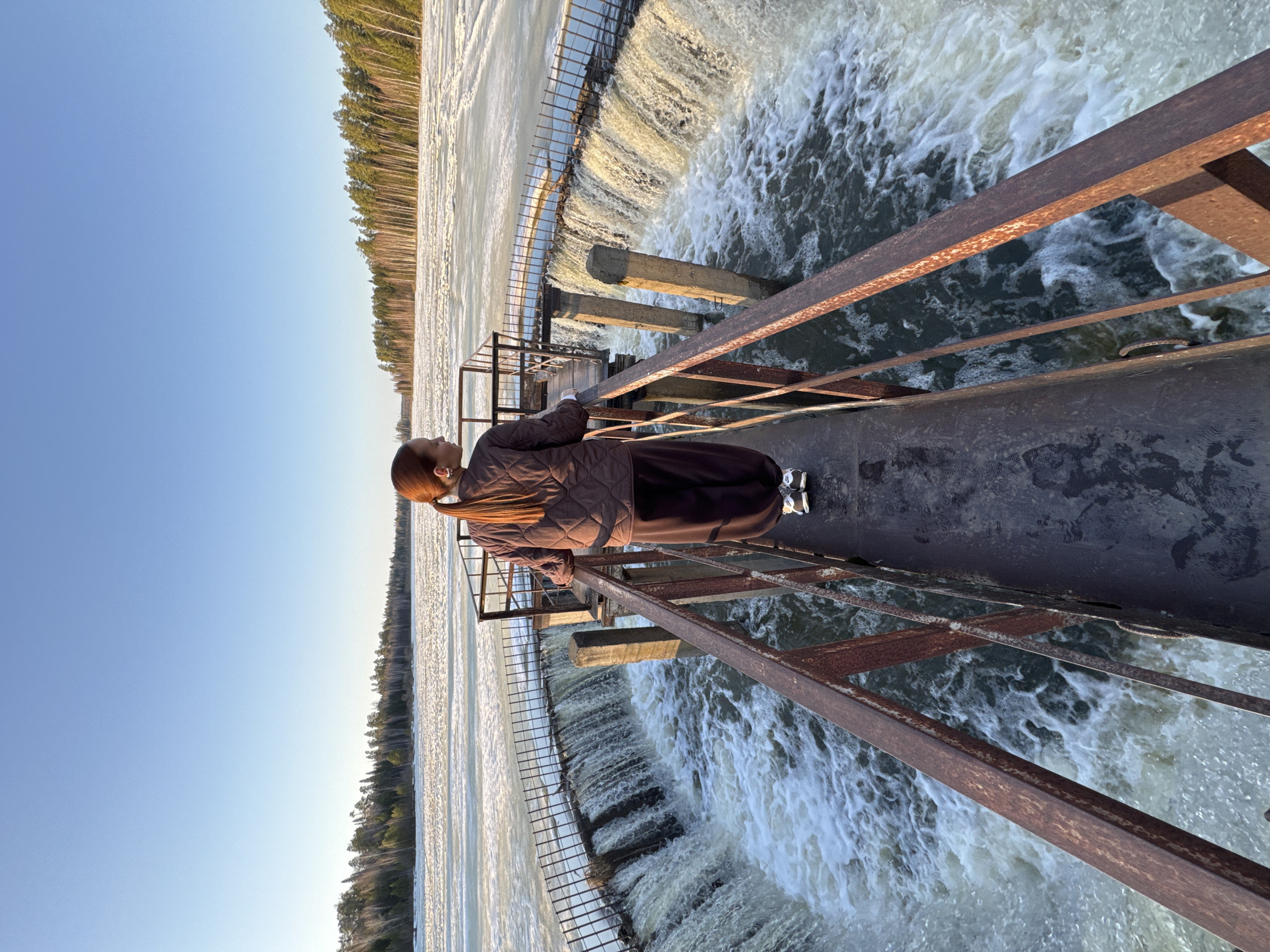 Spring riverside recreation captured at Russian dam site