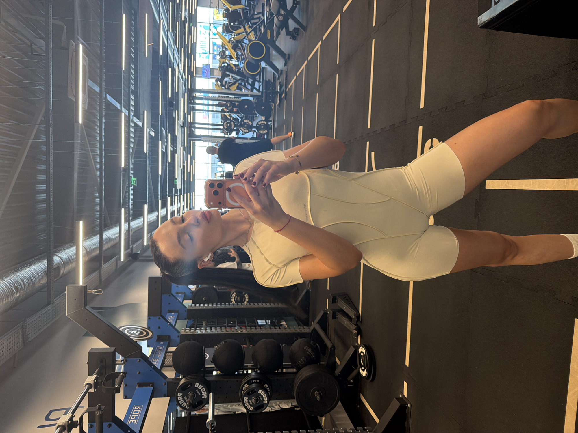 Woman takes gym selfie in Pernik, Bulgaria fitness center