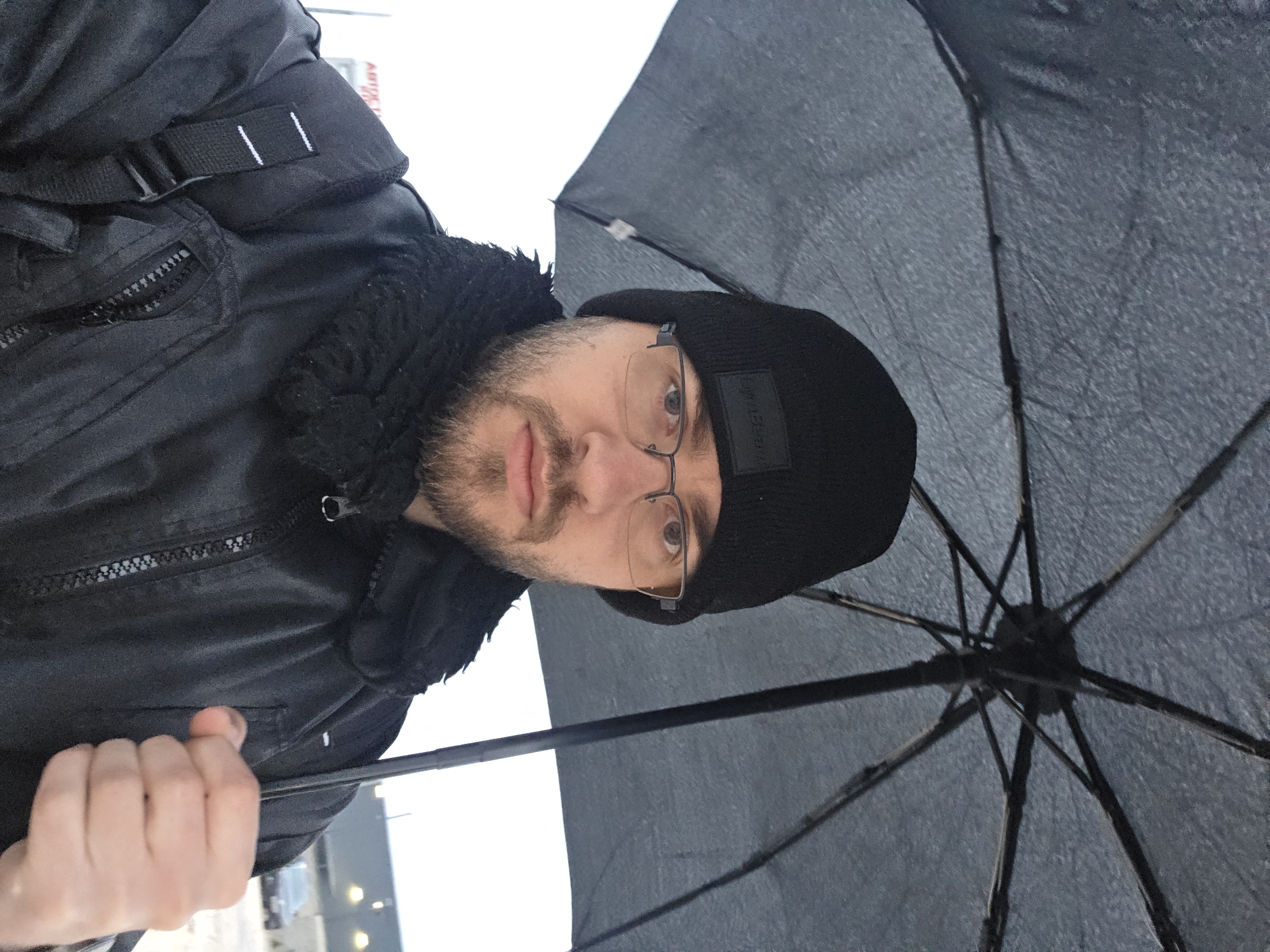 Person with umbrella spotted in Plovdiv early morning