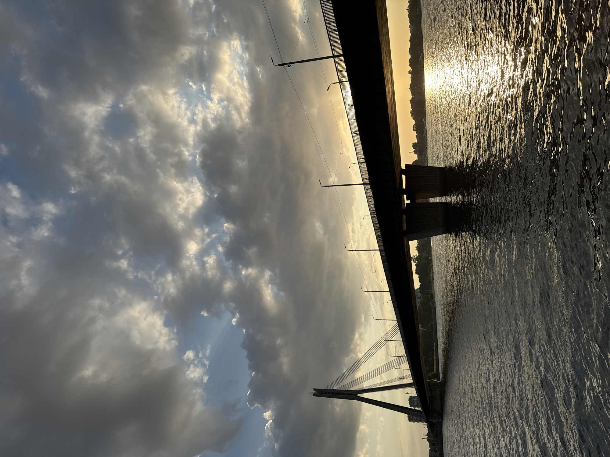 Evening views along Riga's Daugava River and Vanšu Bridge