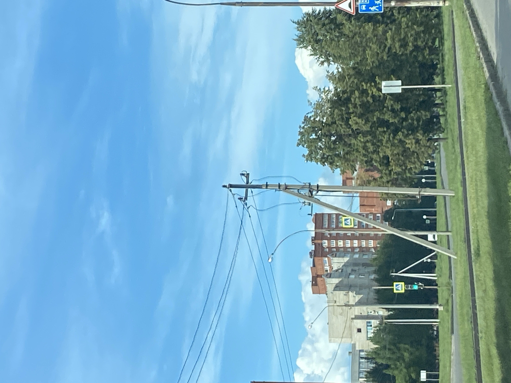 Driving through Tolyatti's residential streets on a sunny afternoon