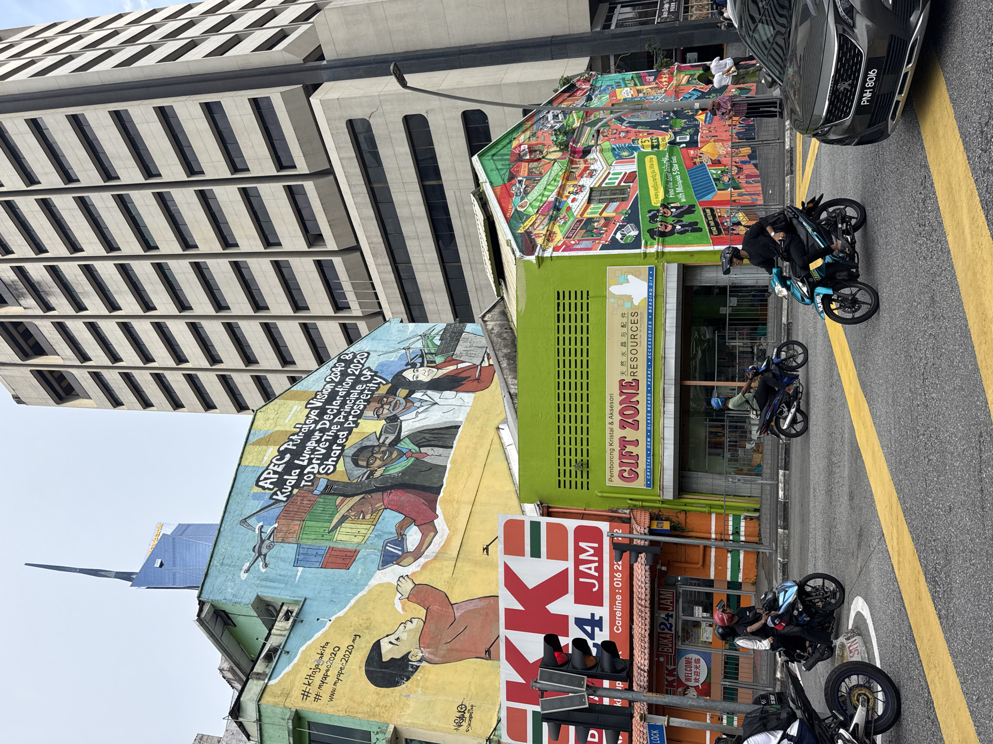 Morning street life documented in Kuala Lumpur's Kasturi Walk