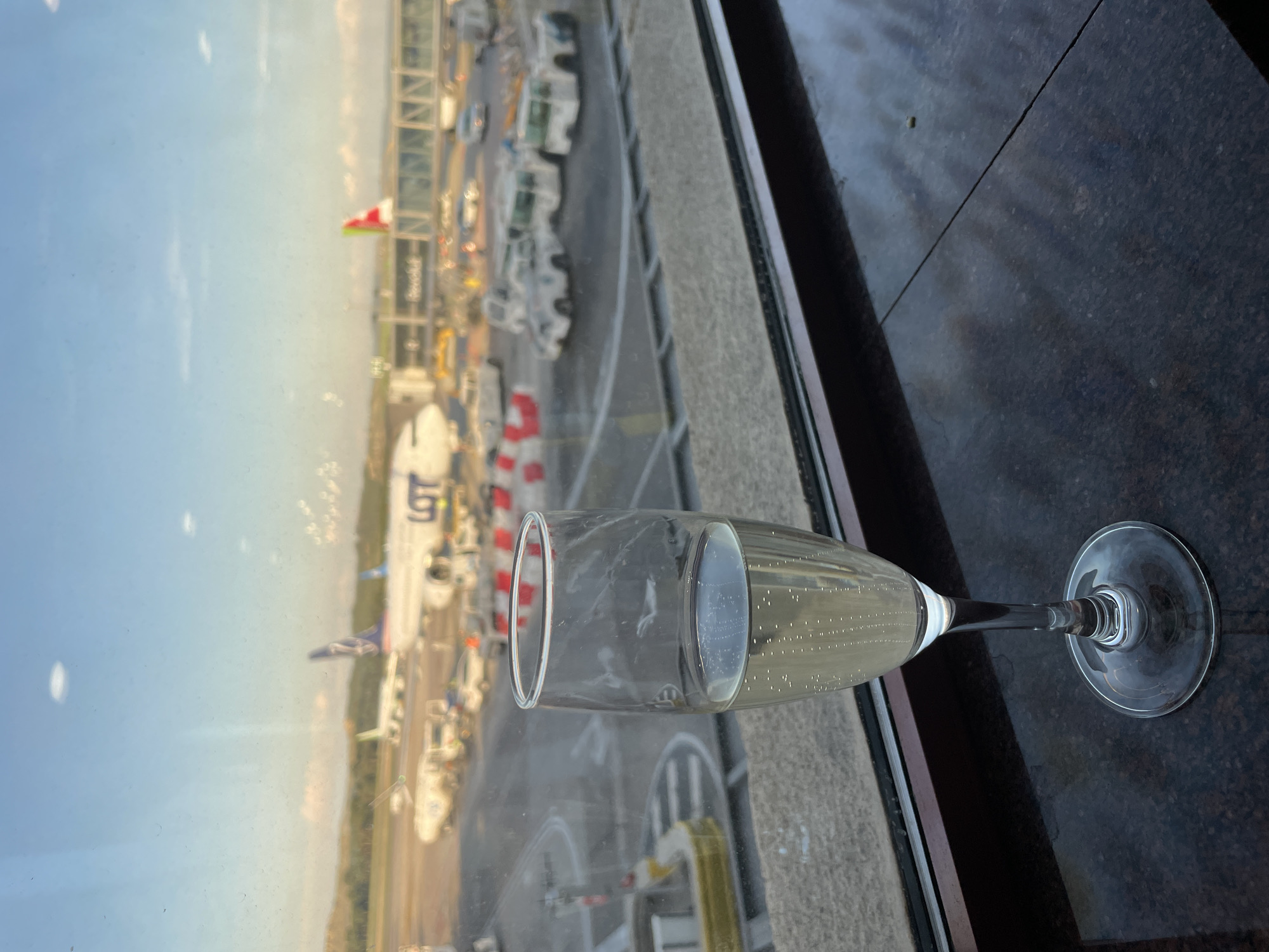 Champagne toast view overlooking Madrid Barajas Airport