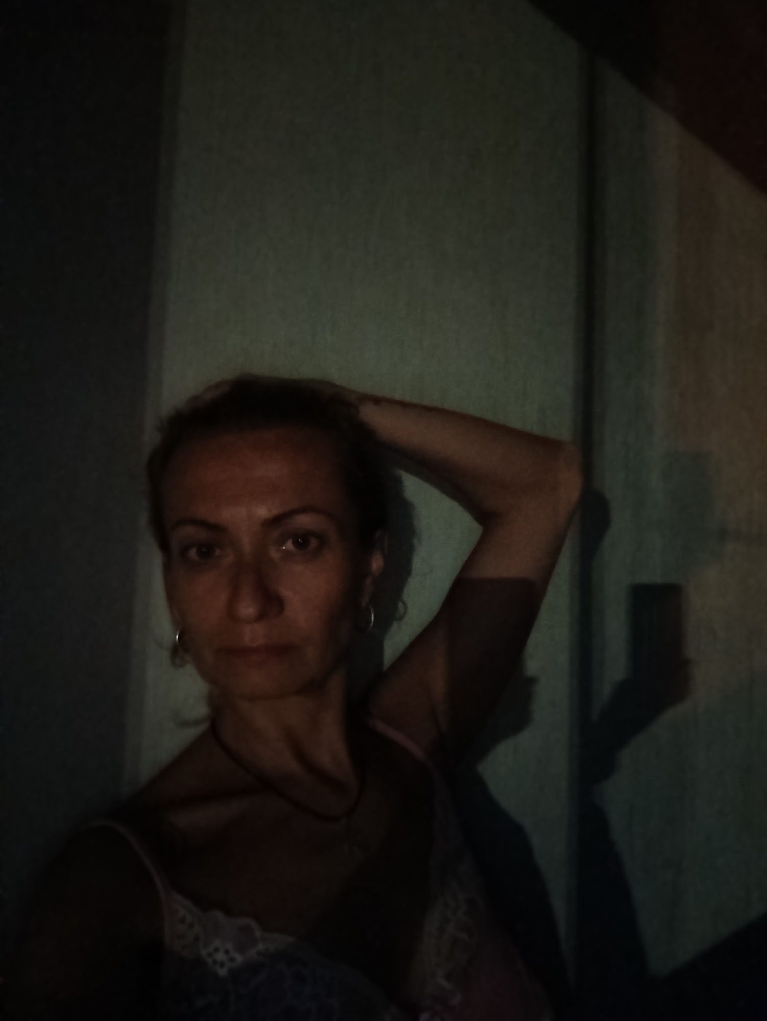 Indoor selfie session in a Moscow apartment, evening light.