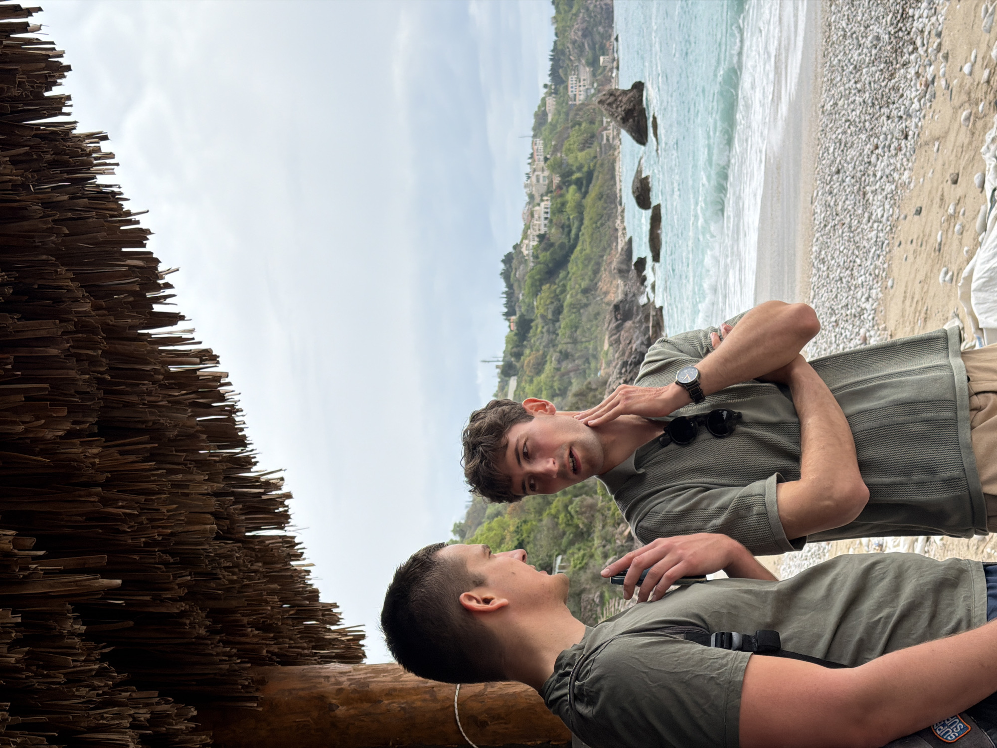 Two men observed in conversation on Montenegro beach