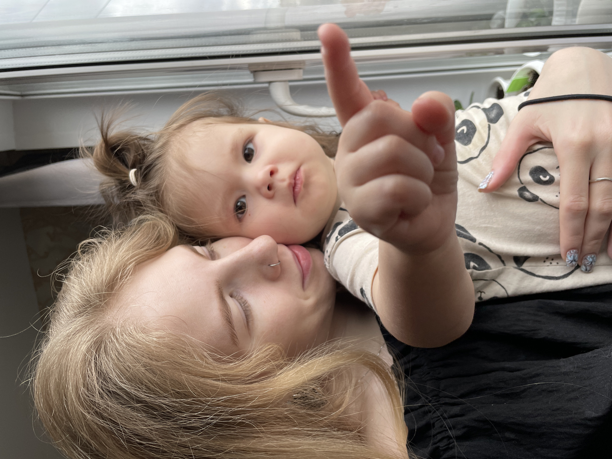 Mother and child photographed together in Izhevsk home