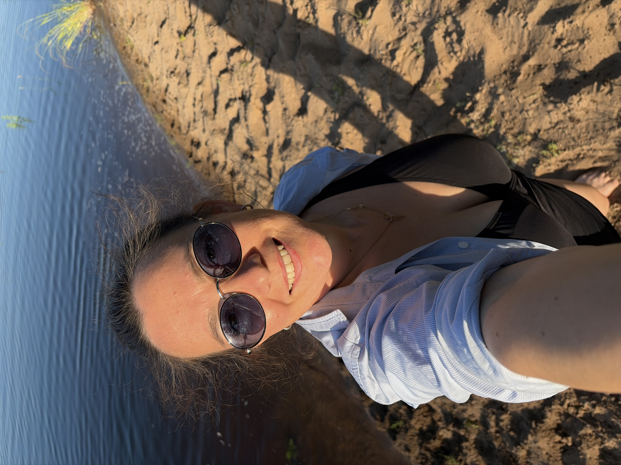Summer day on a Russian river — swimming, shore, and fish cages