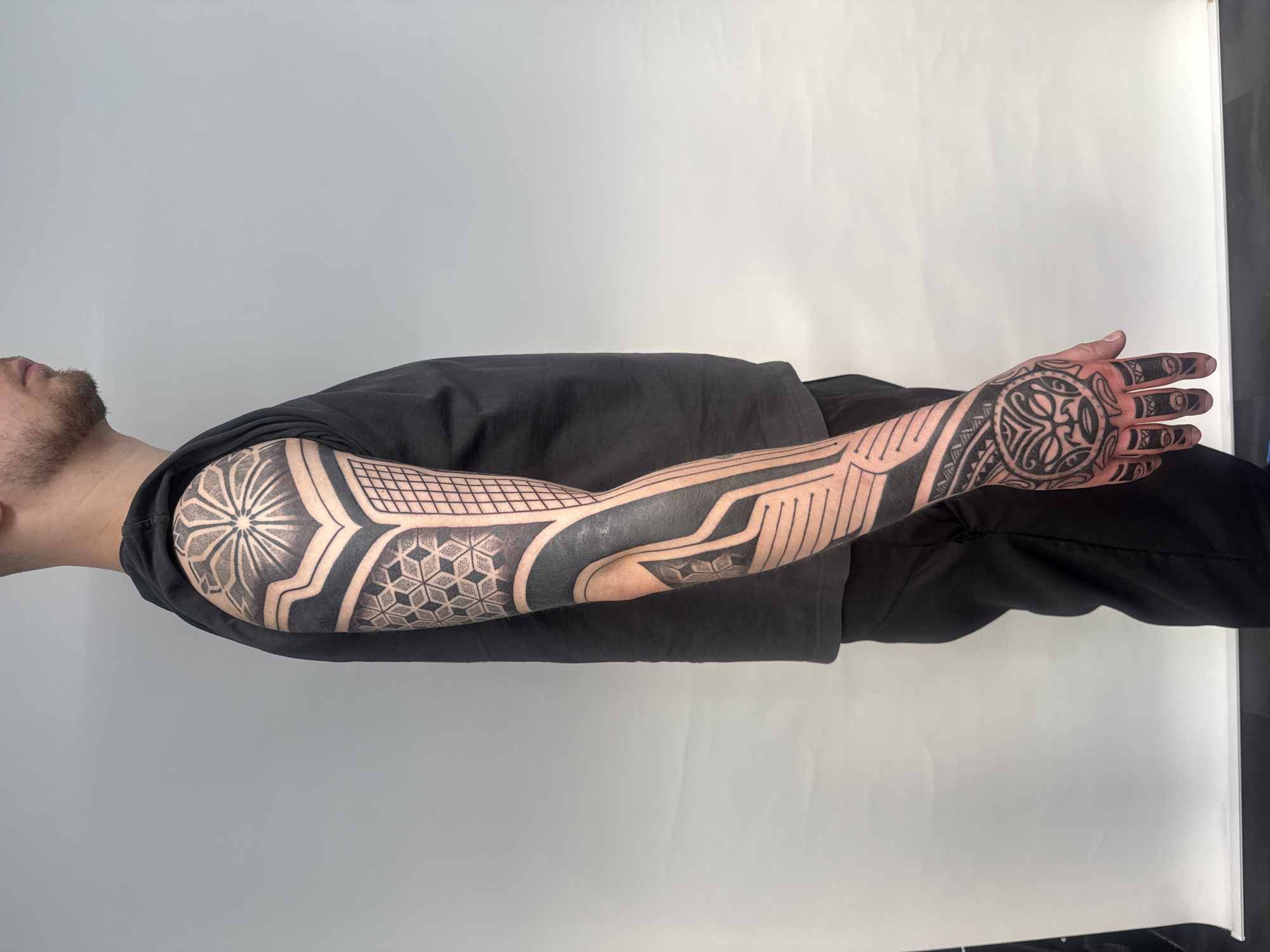 Elaborate geometric sleeve tattoo observed in Sofia, Bulgaria