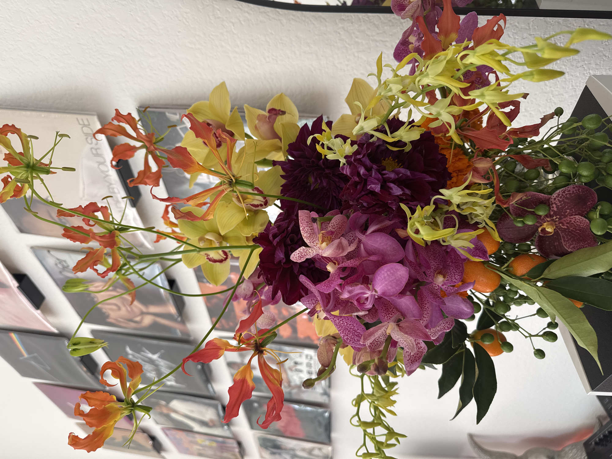 Colorful floral arrangement with orchids, lilies photographed in Los Angeles