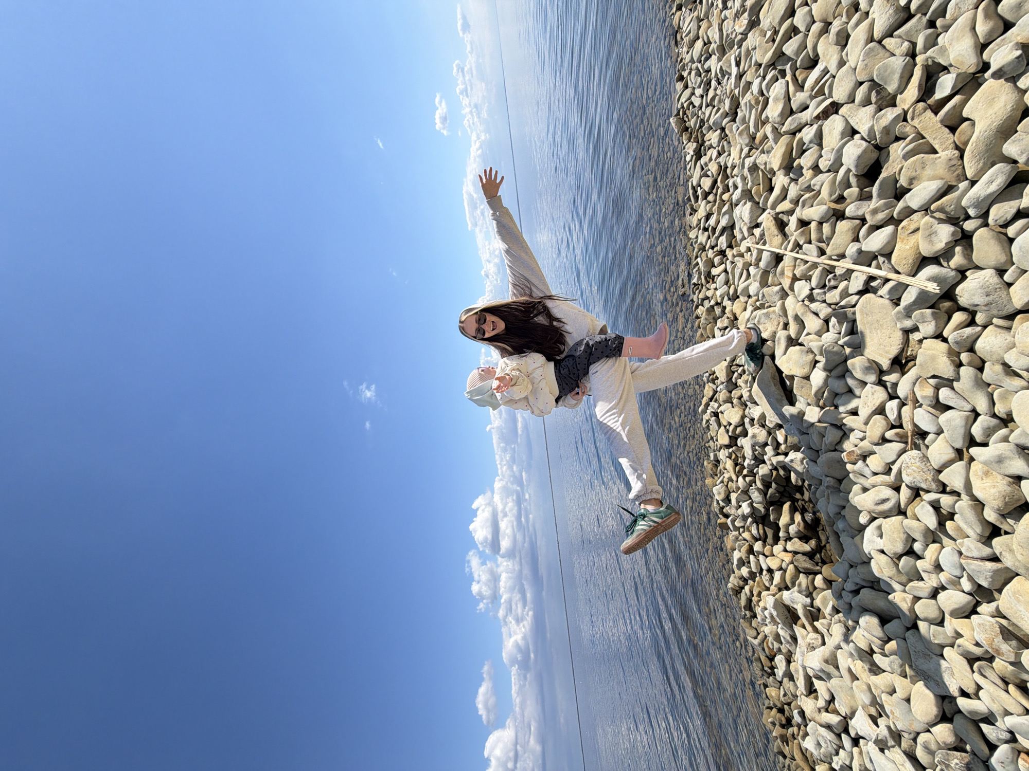 Family enjoys leisurely morning at Volga River beach in Kamyshin
