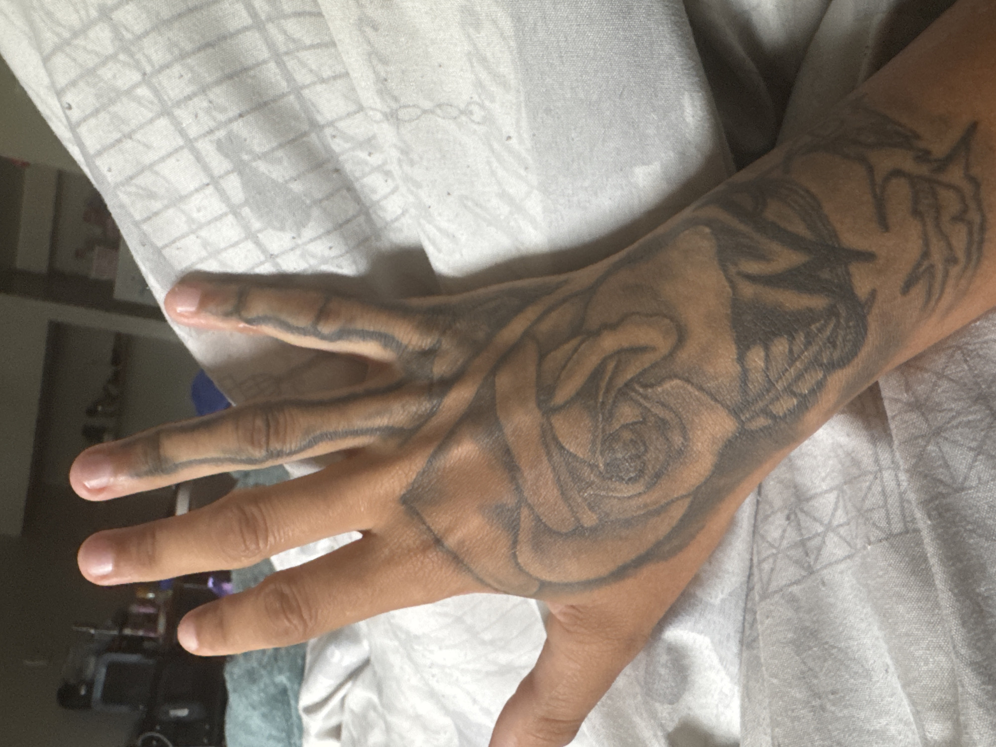 Tattooed hand and handmade crafts documented in Winchester home