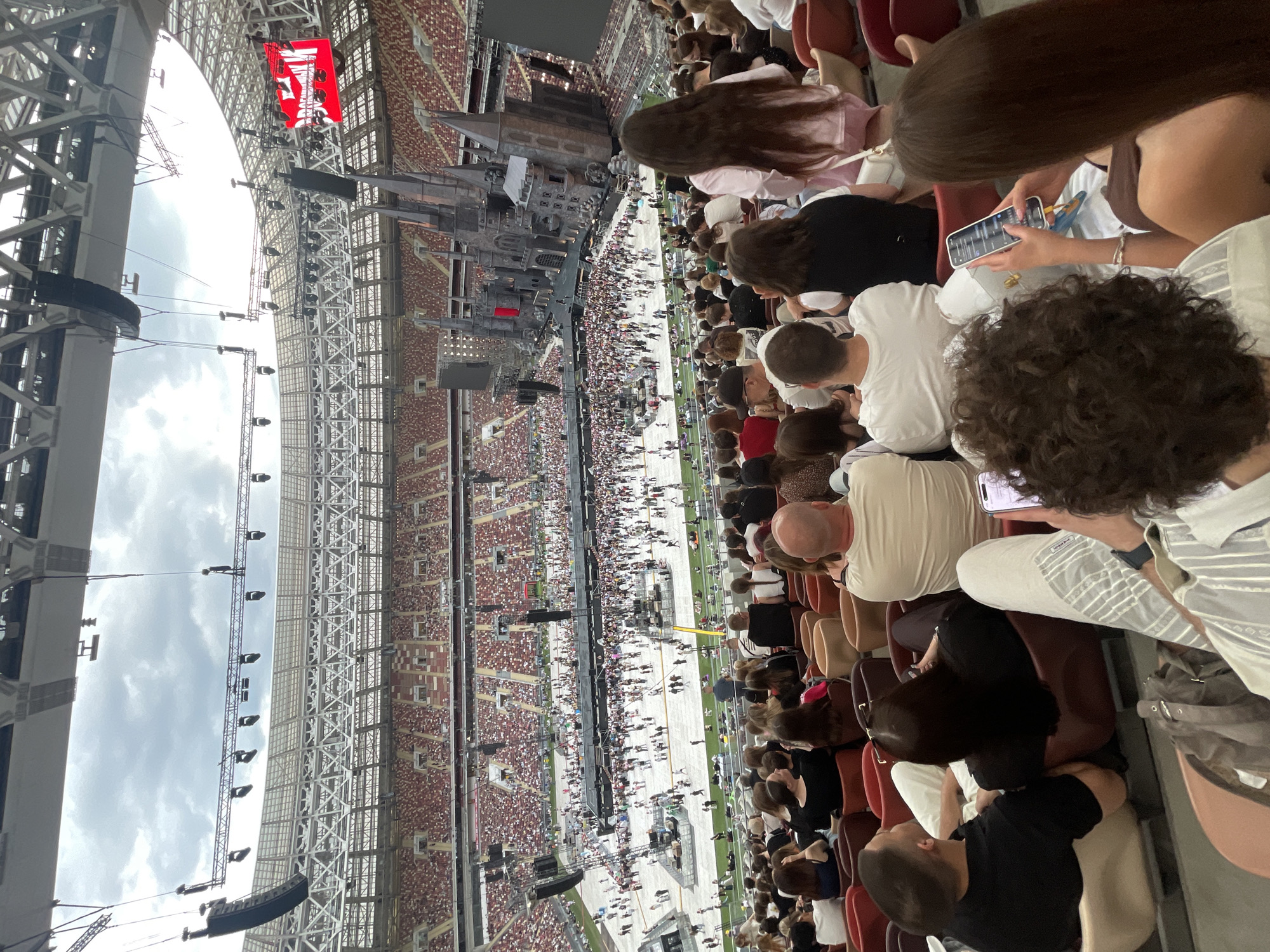 Packed Luzhniki Stadium hosts a massive concert with medieval castle stage