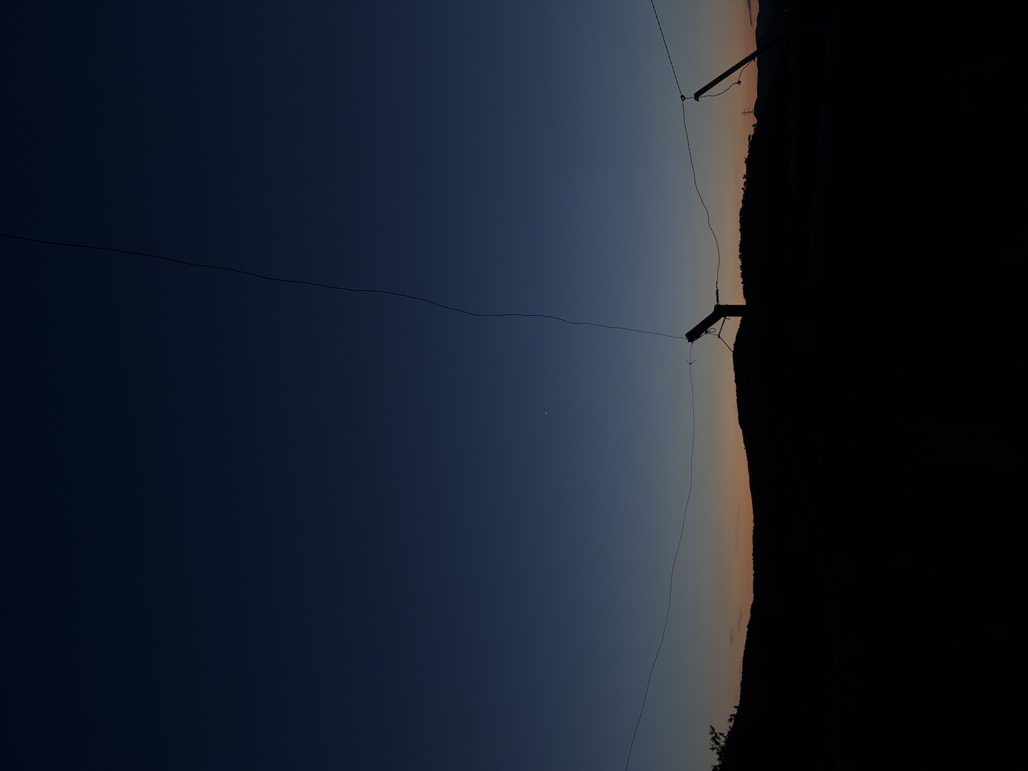 Evening documentation captures twilight, moon, dog in Sant Martí Sarroca