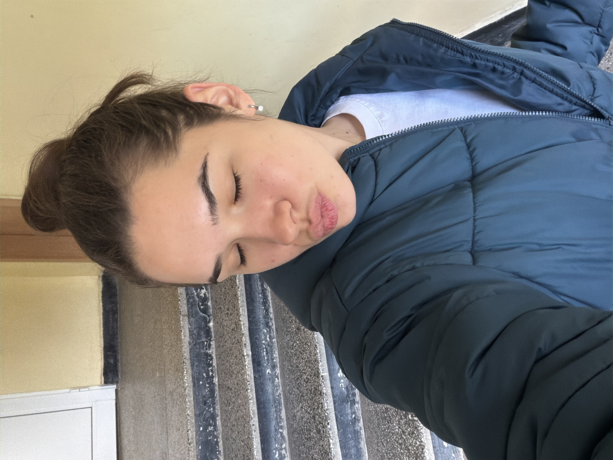Woman in blue jacket observed resting in Sofia
