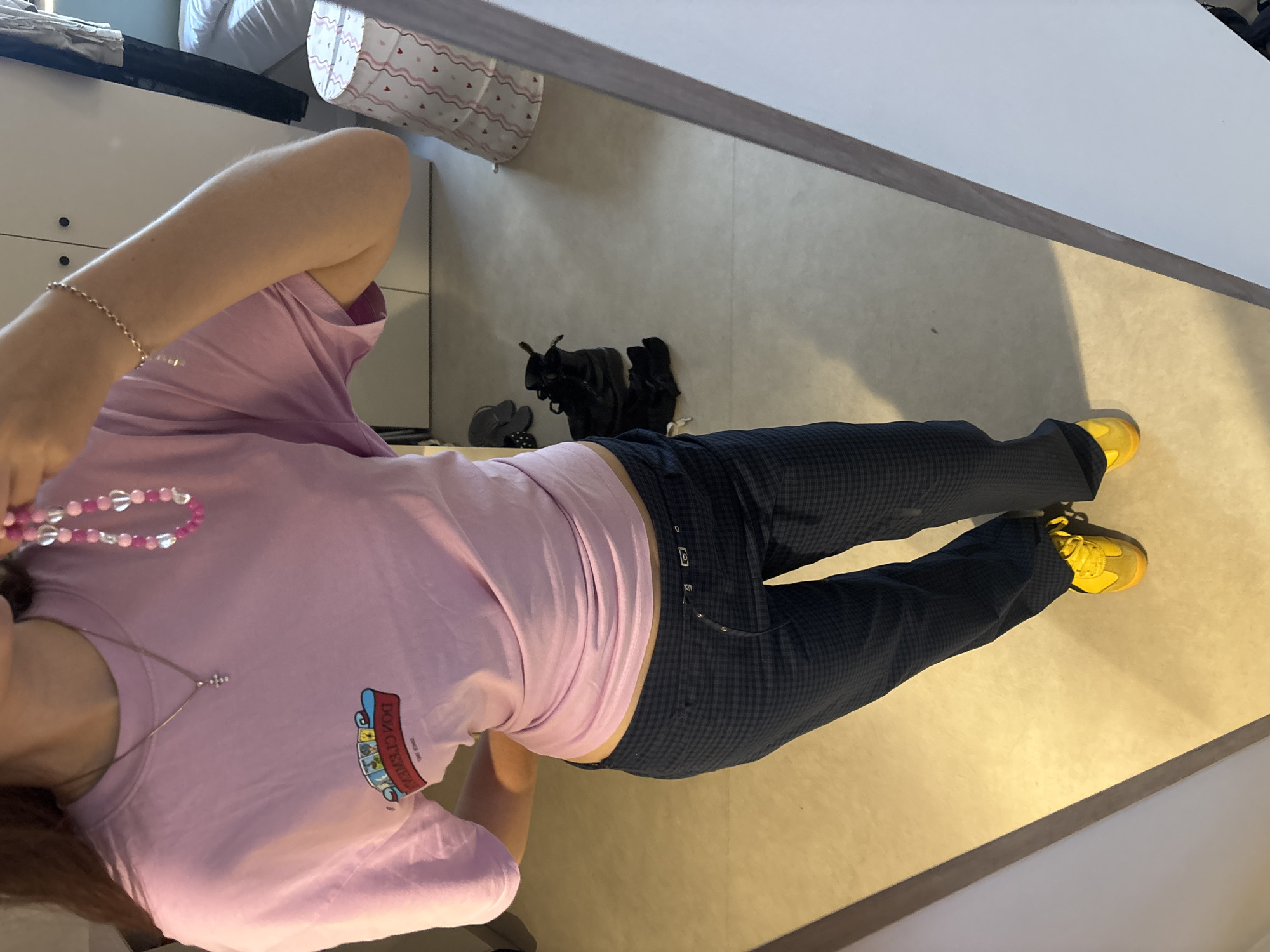 Casual fashion moment captured in Getafe mirror reflection