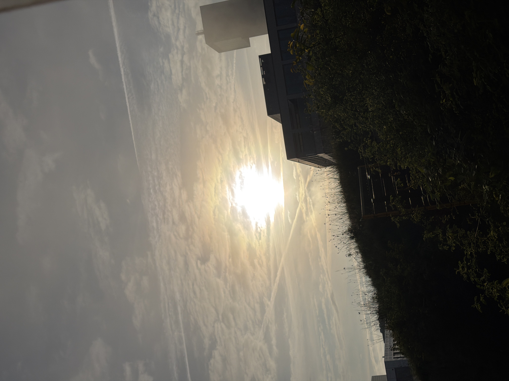 Morning sun breaks through clouds over Leudelange, Luxembourg