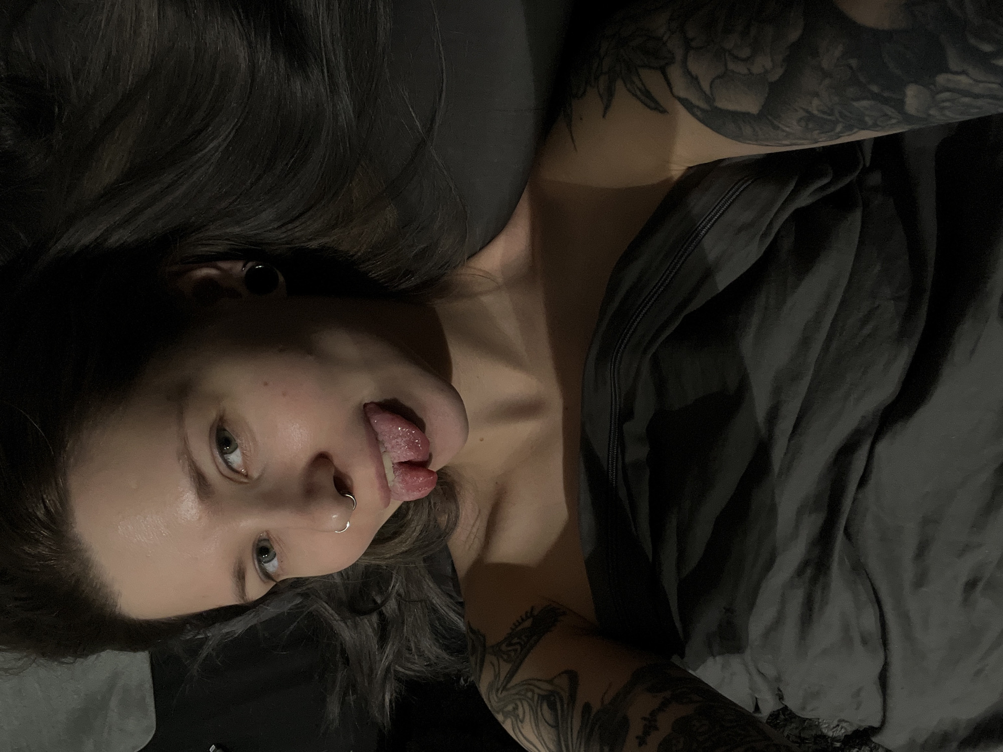 Young person with dark hair photographed lying down in Khimki