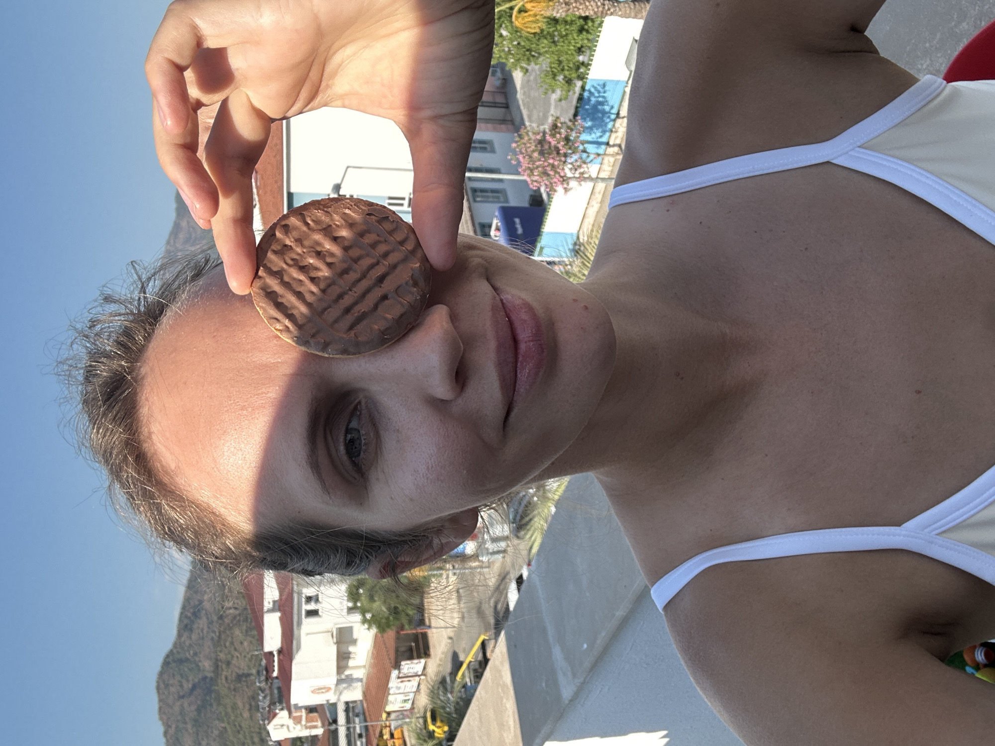 Balcony snacks and selfies over Fethiye's mountain backdrop