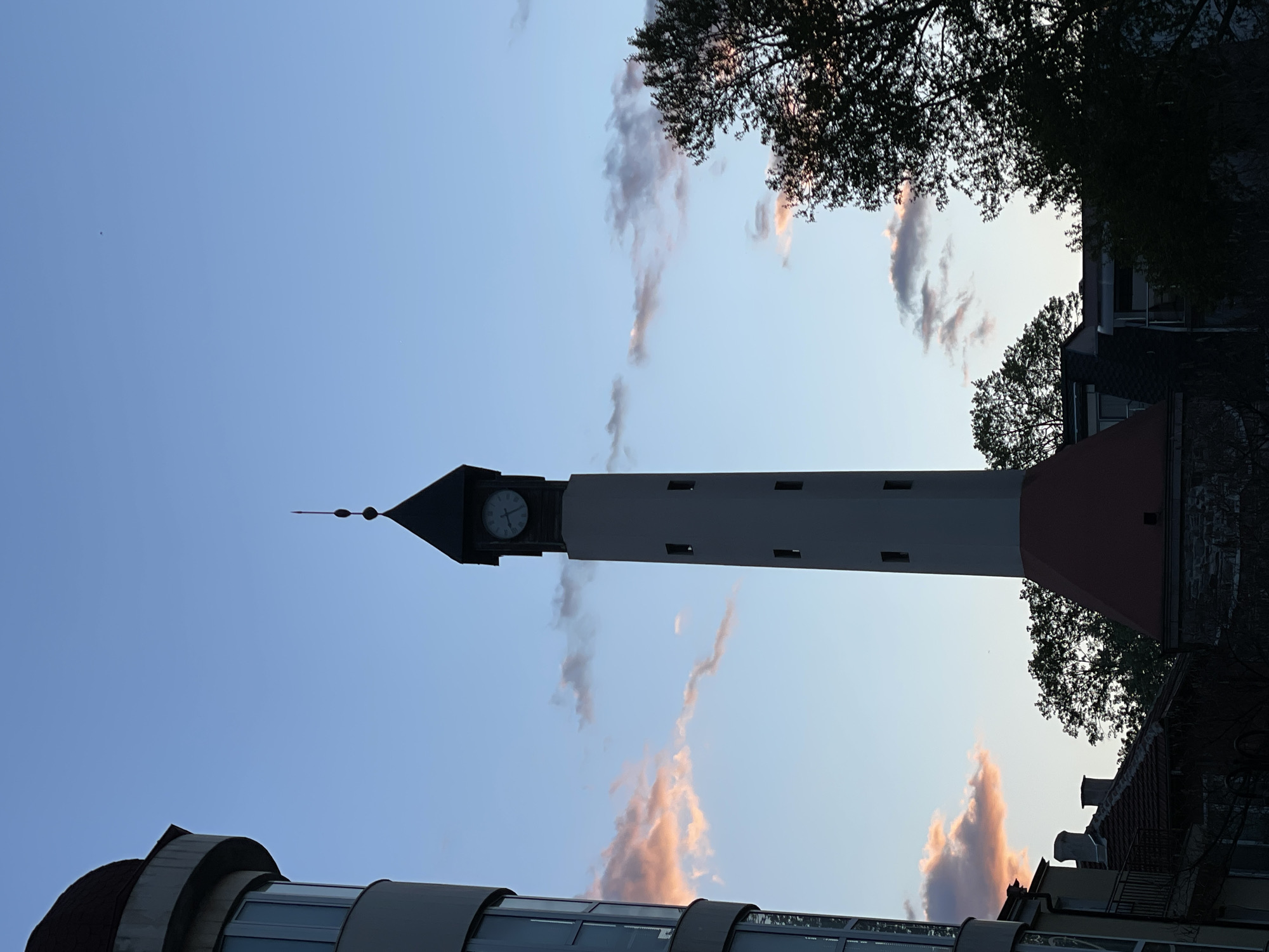 Clock tower observed under dramatic skies in Pazardzhik, Bulgaria