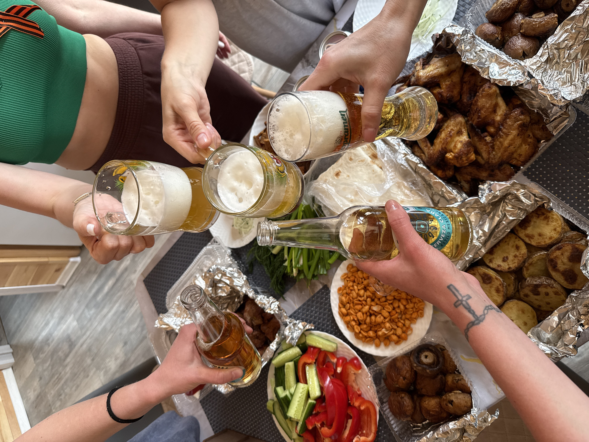 Social gathering with food and drinks observed in Krasnoyarsk