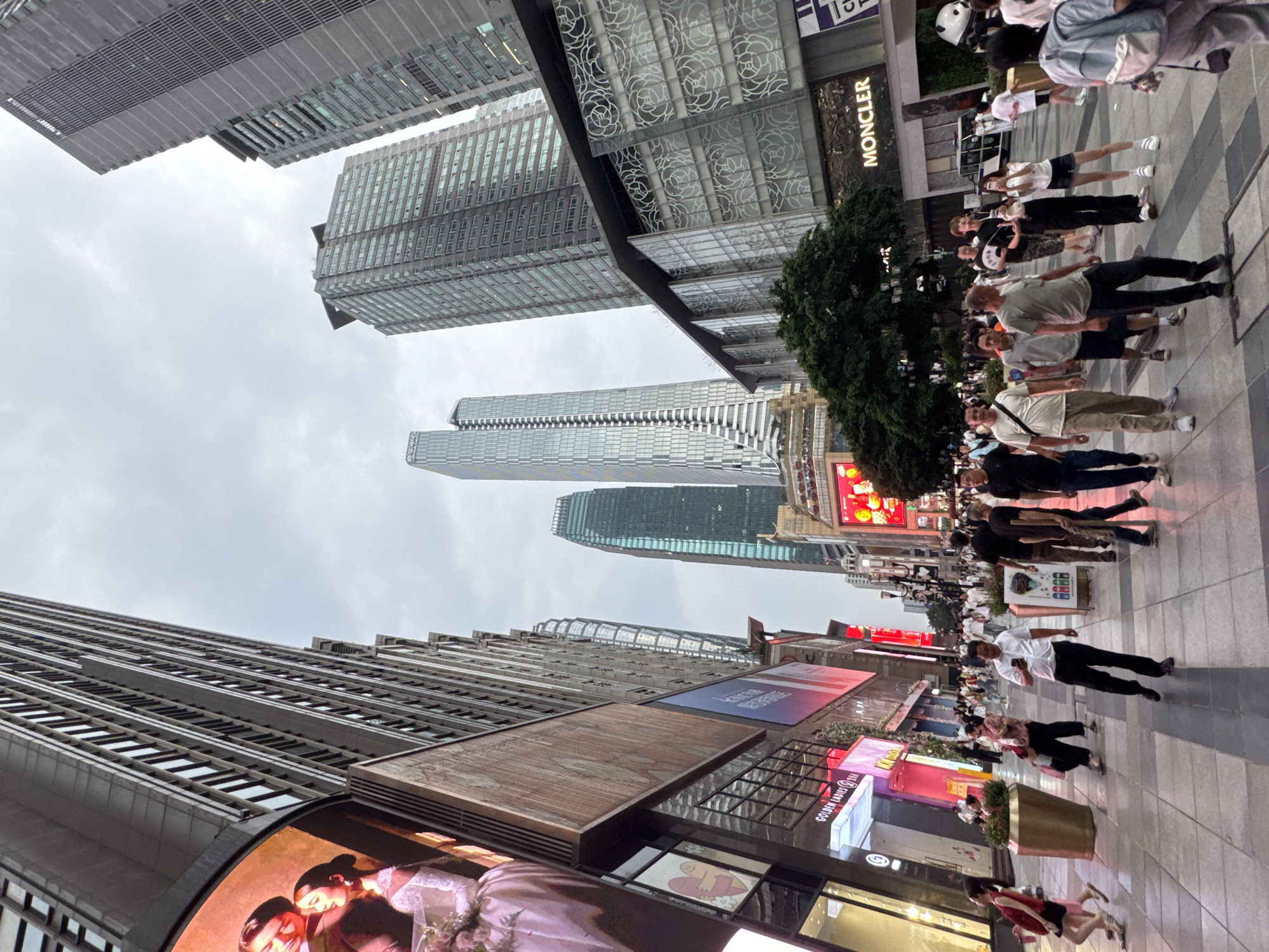 Street life and storefronts in Chongqing's busy Yuzhong District