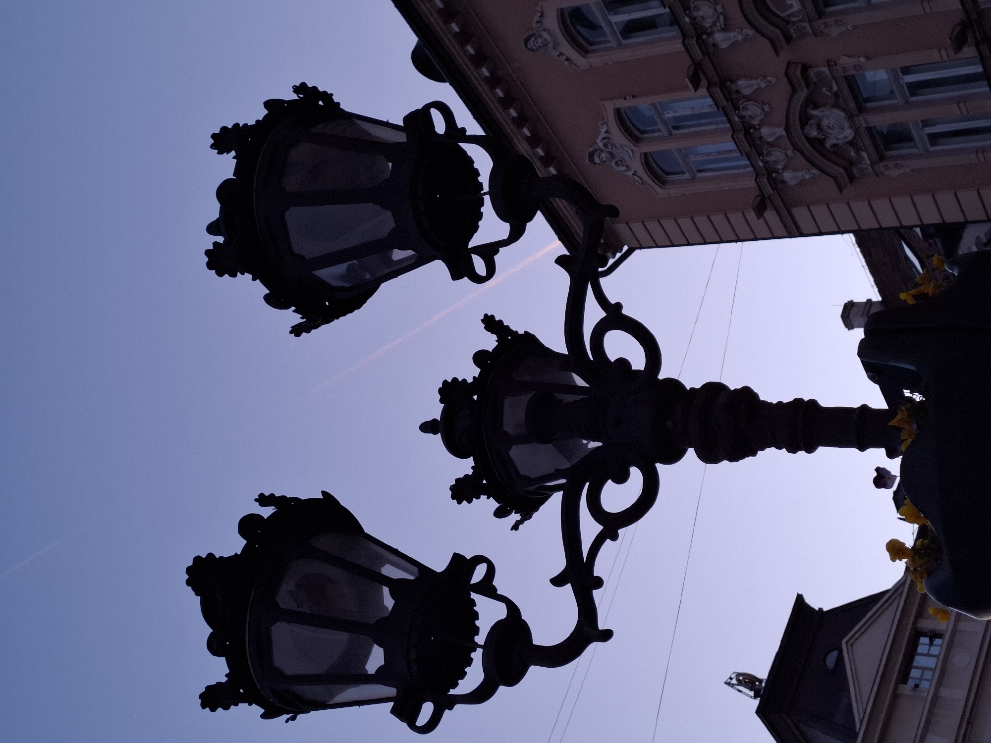 Tourist photographs historic church architecture in Novi Sad