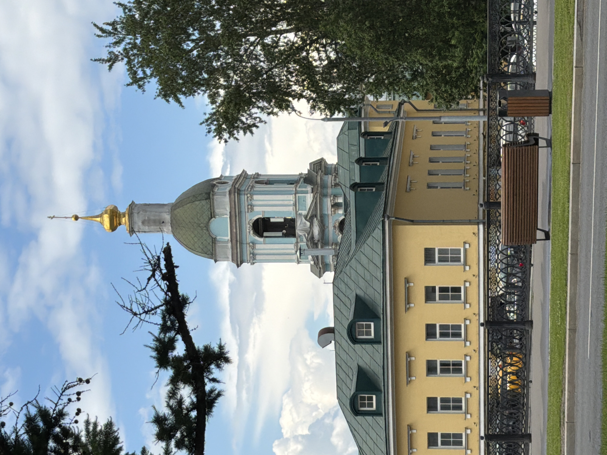 Woman documents casual walking tour of Podolsk landmarks