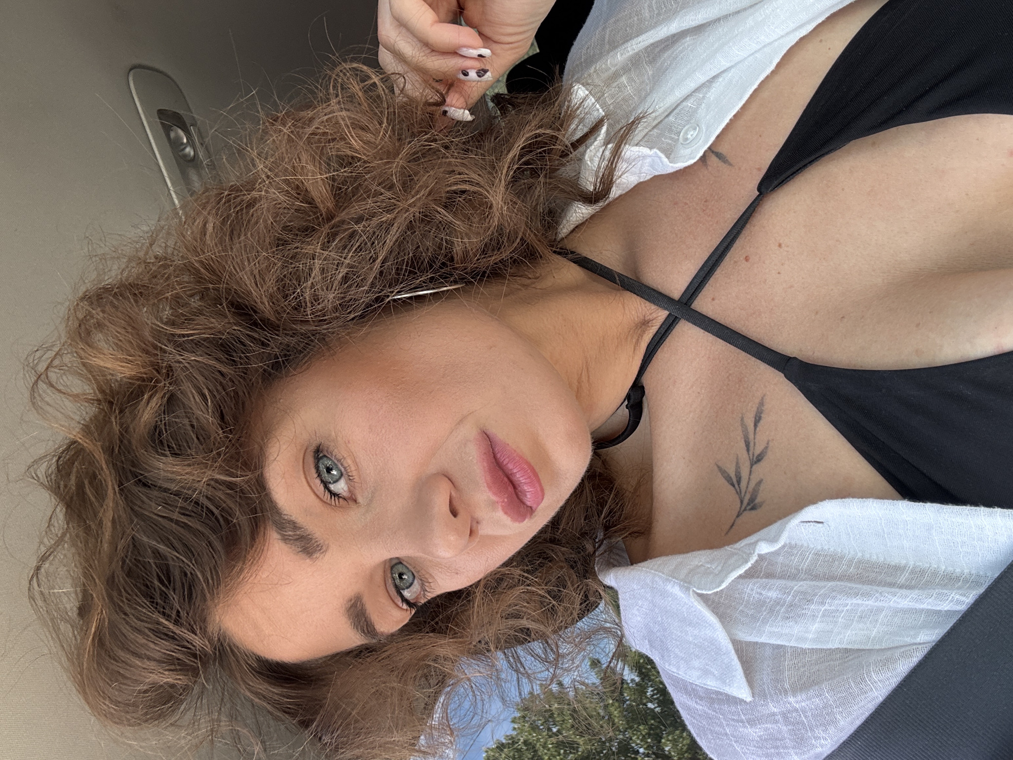Woman photographed inside car in Prijevor, Montenegro