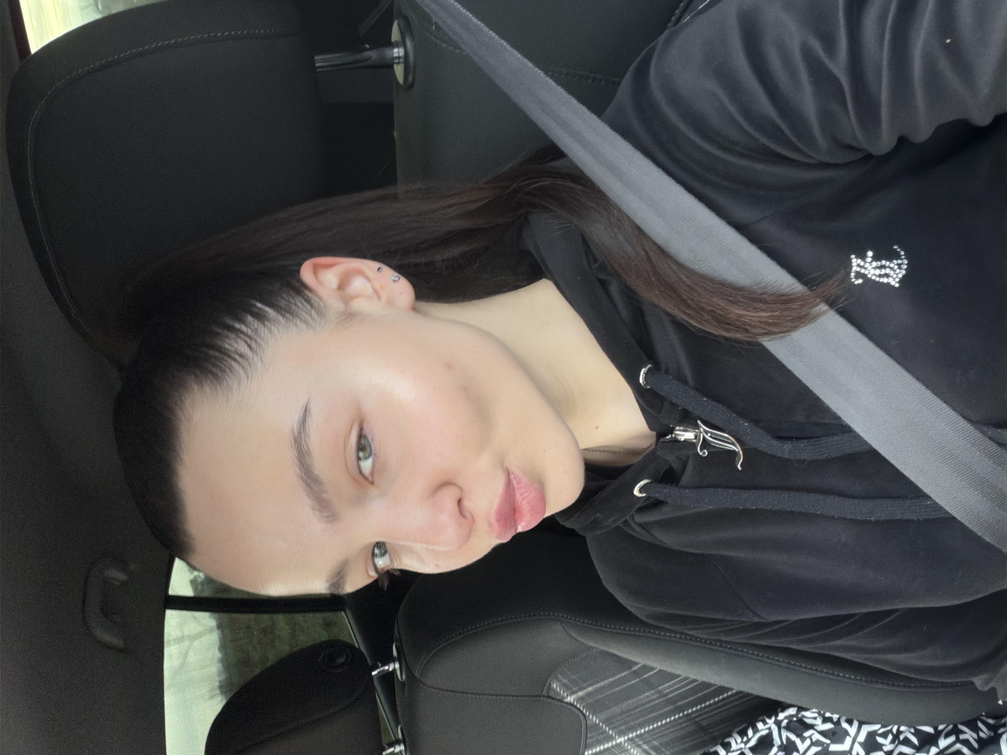 Woman takes car selfies in early morning Bulgaria