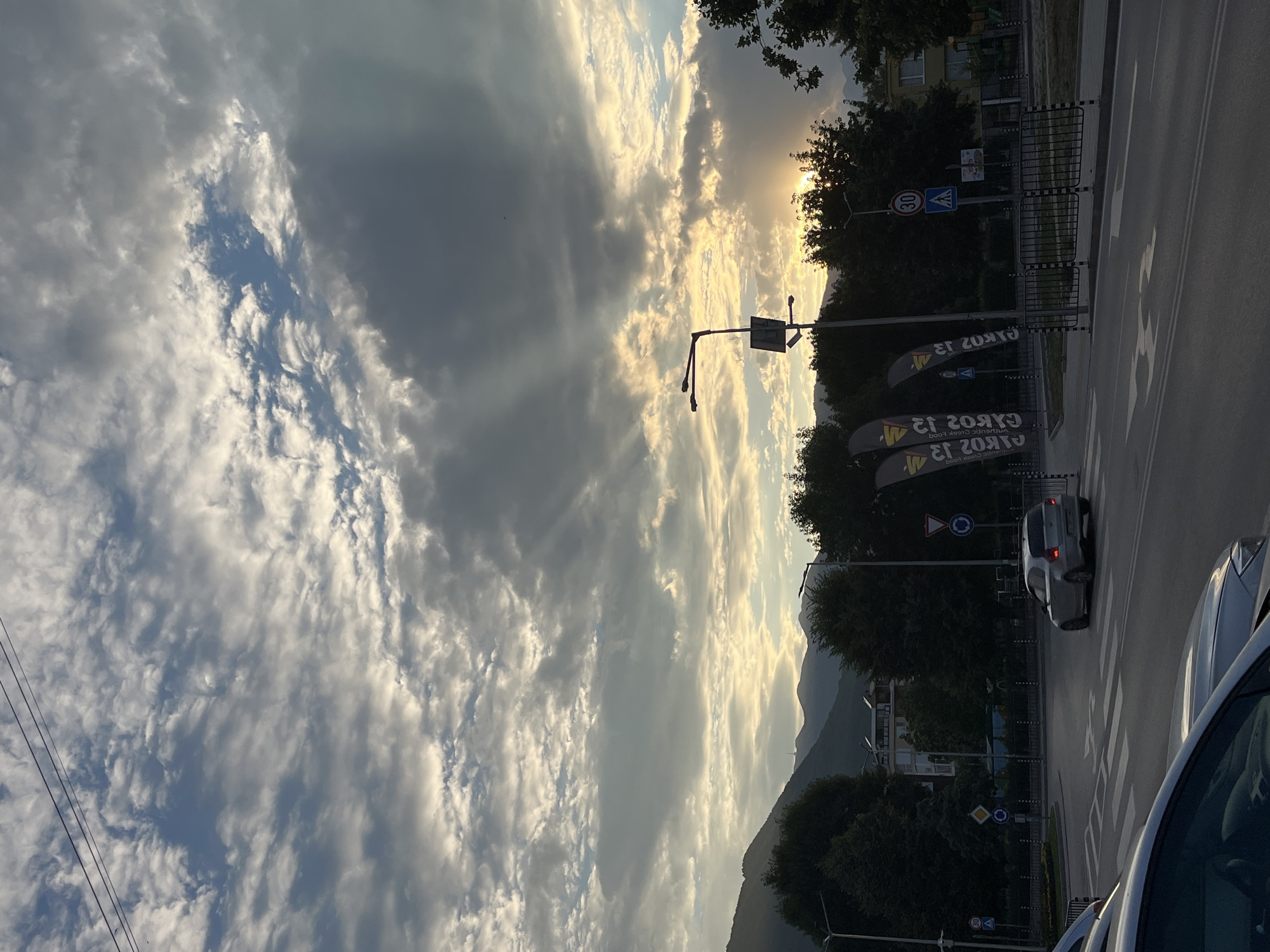 Golden hour light over Gotse Delchev streets and mountains