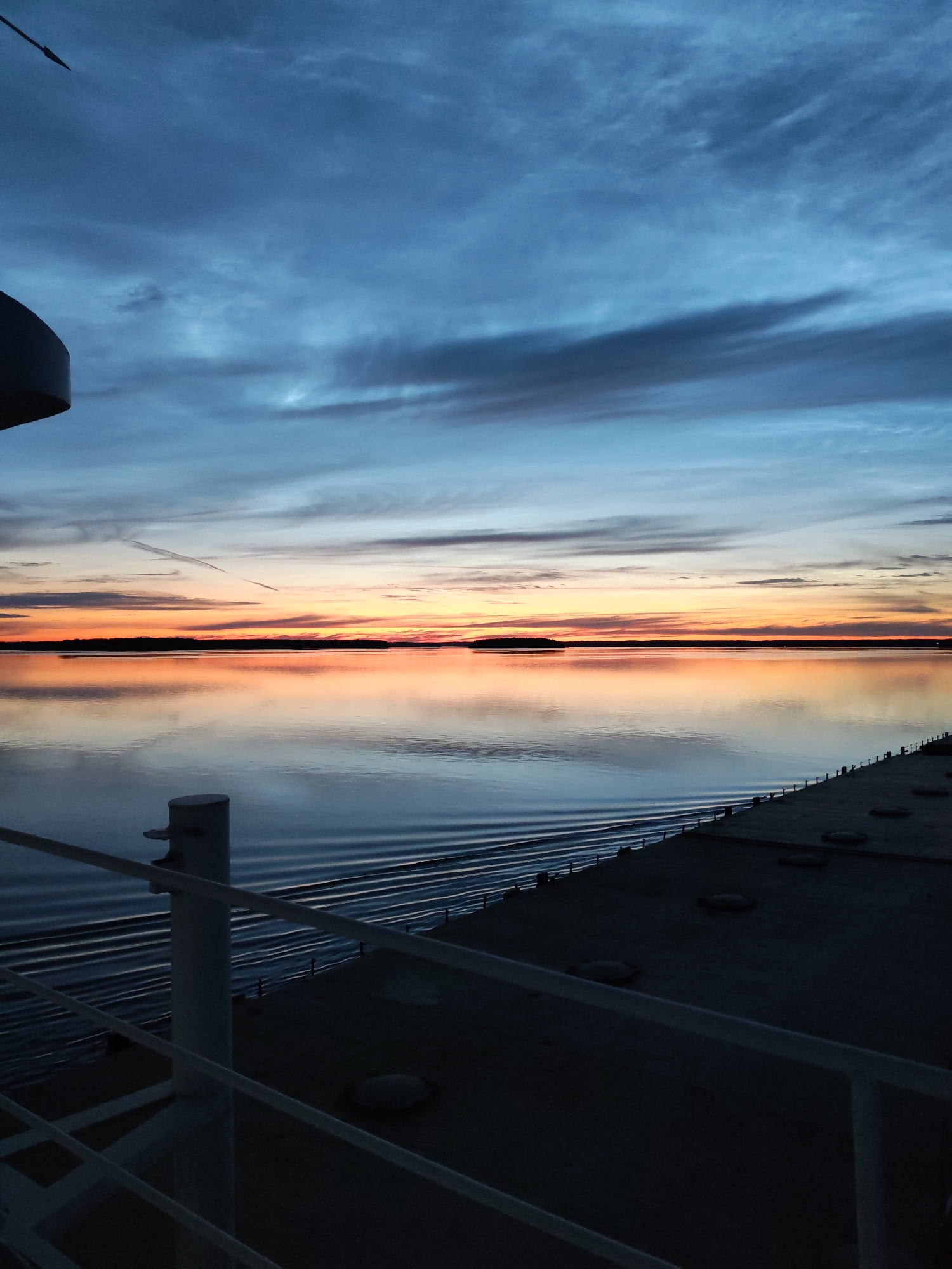 Dusk on the water: ship deck views near Malinukha, Russia