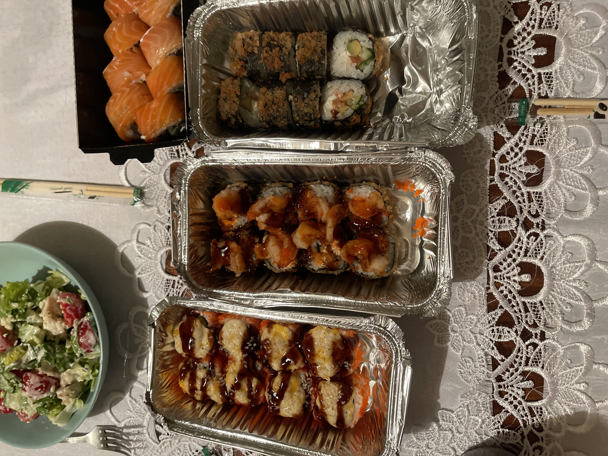 Home table set with flowers and a fresh meal in Khimki