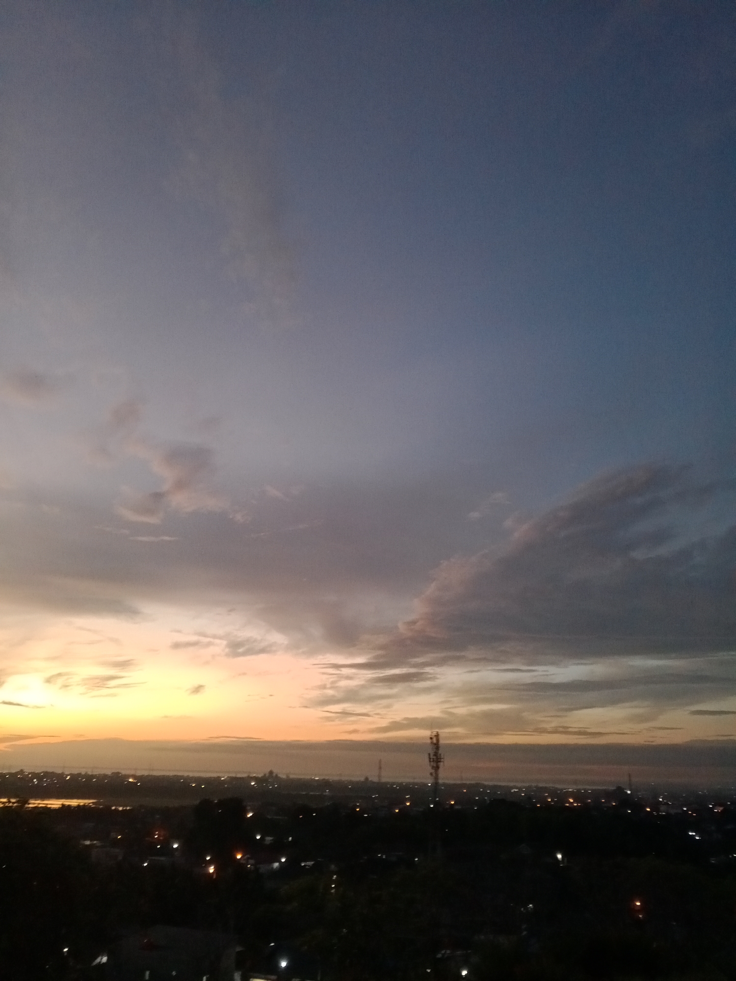 Dramatic sunset captured across Lhokseumawe, Indonesia during evening hours